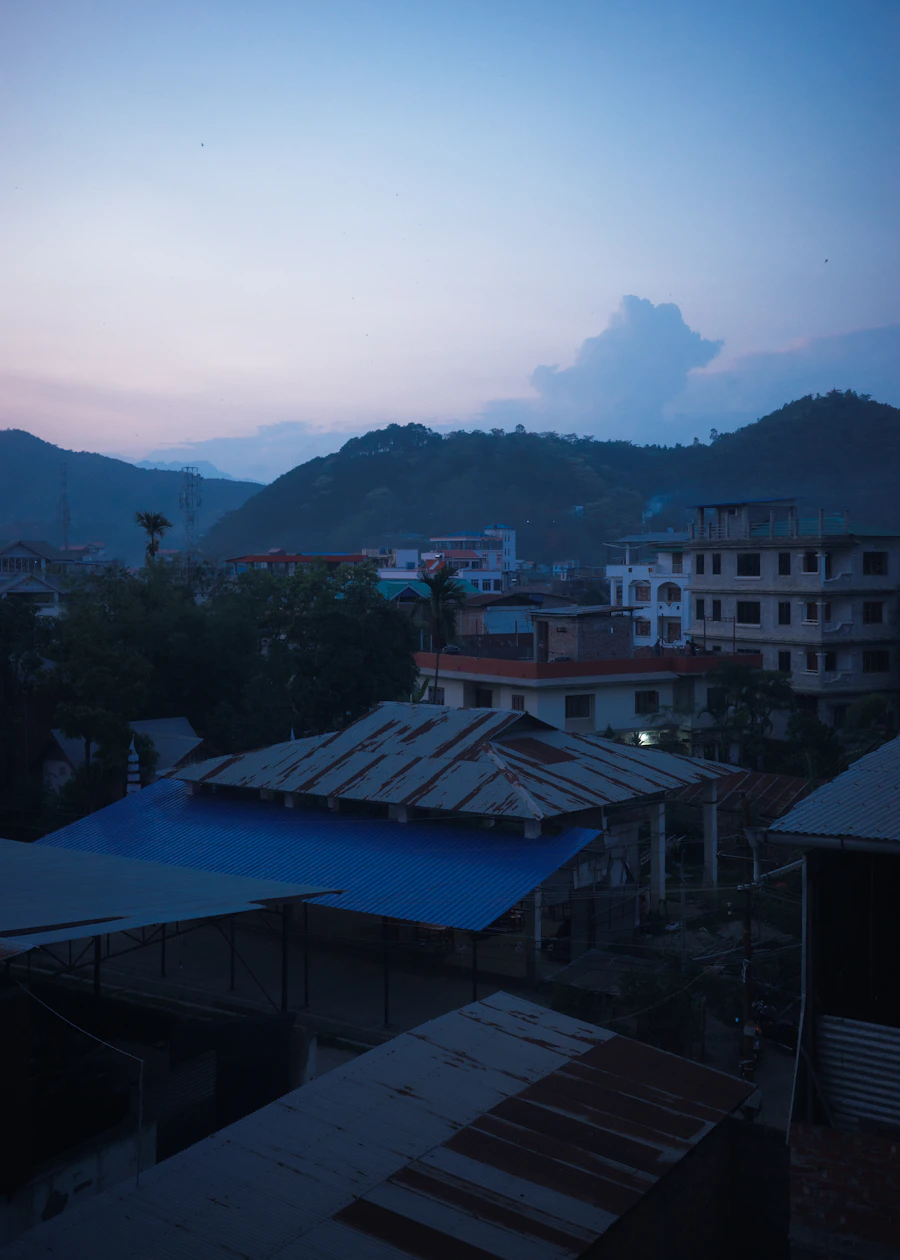 Imphal city and surrounding mountain landscape at dusk