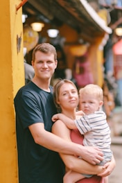 A family posing for a picture outdoors
