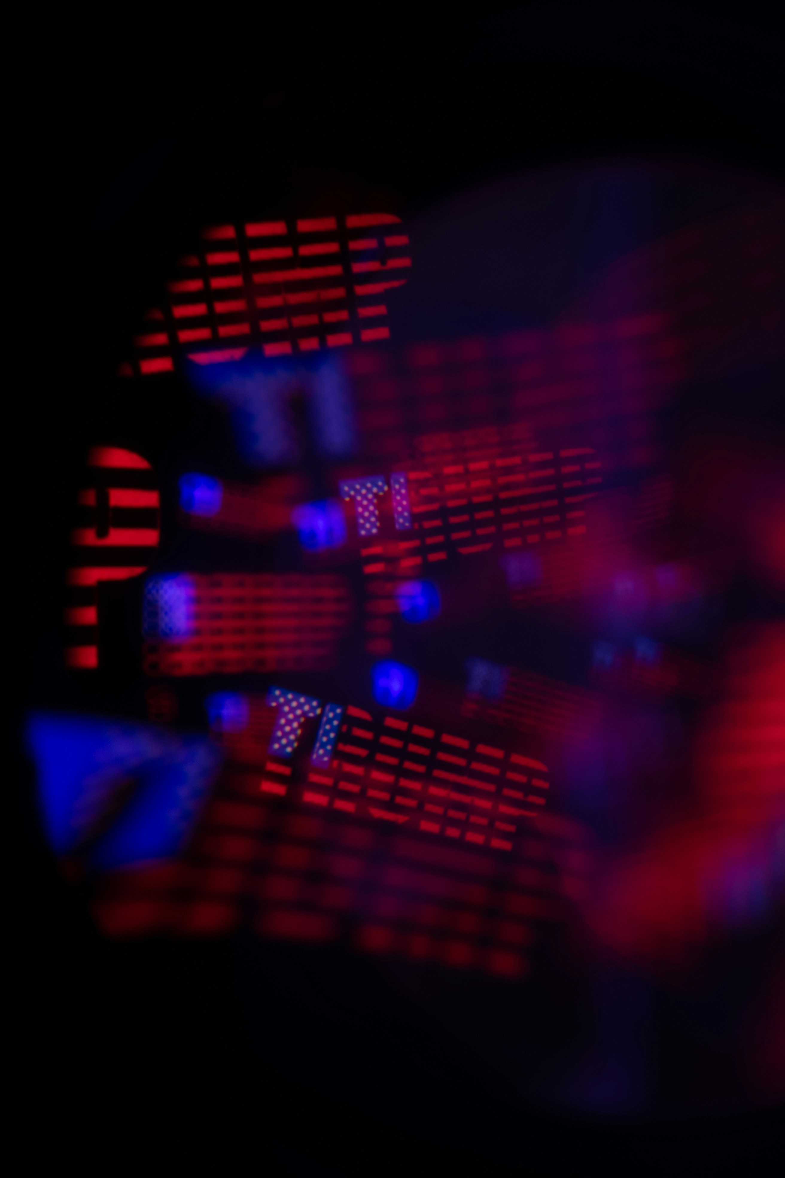 Abstract red and blue lights blurred in darkness