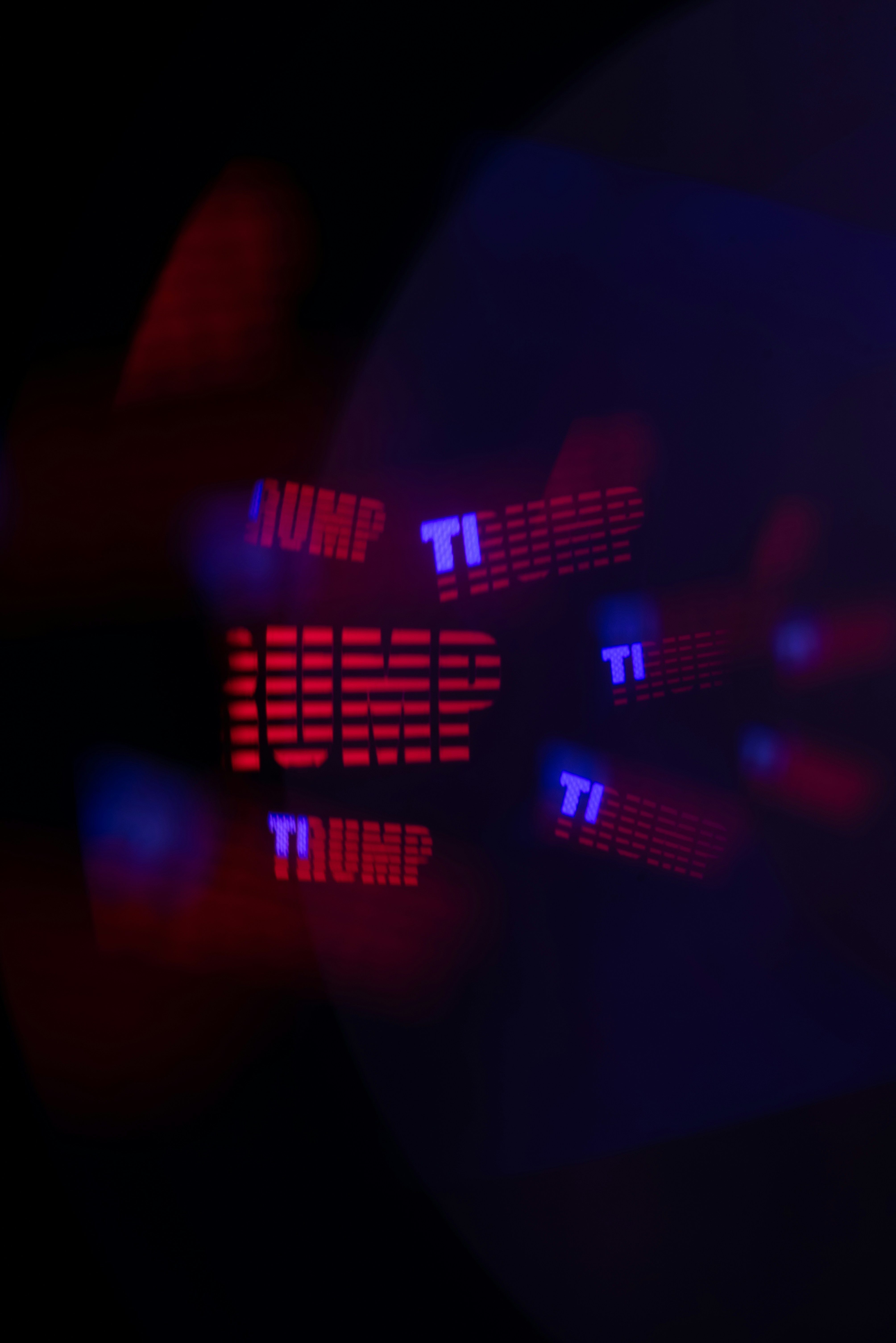 Red and blue neon lights spell out words