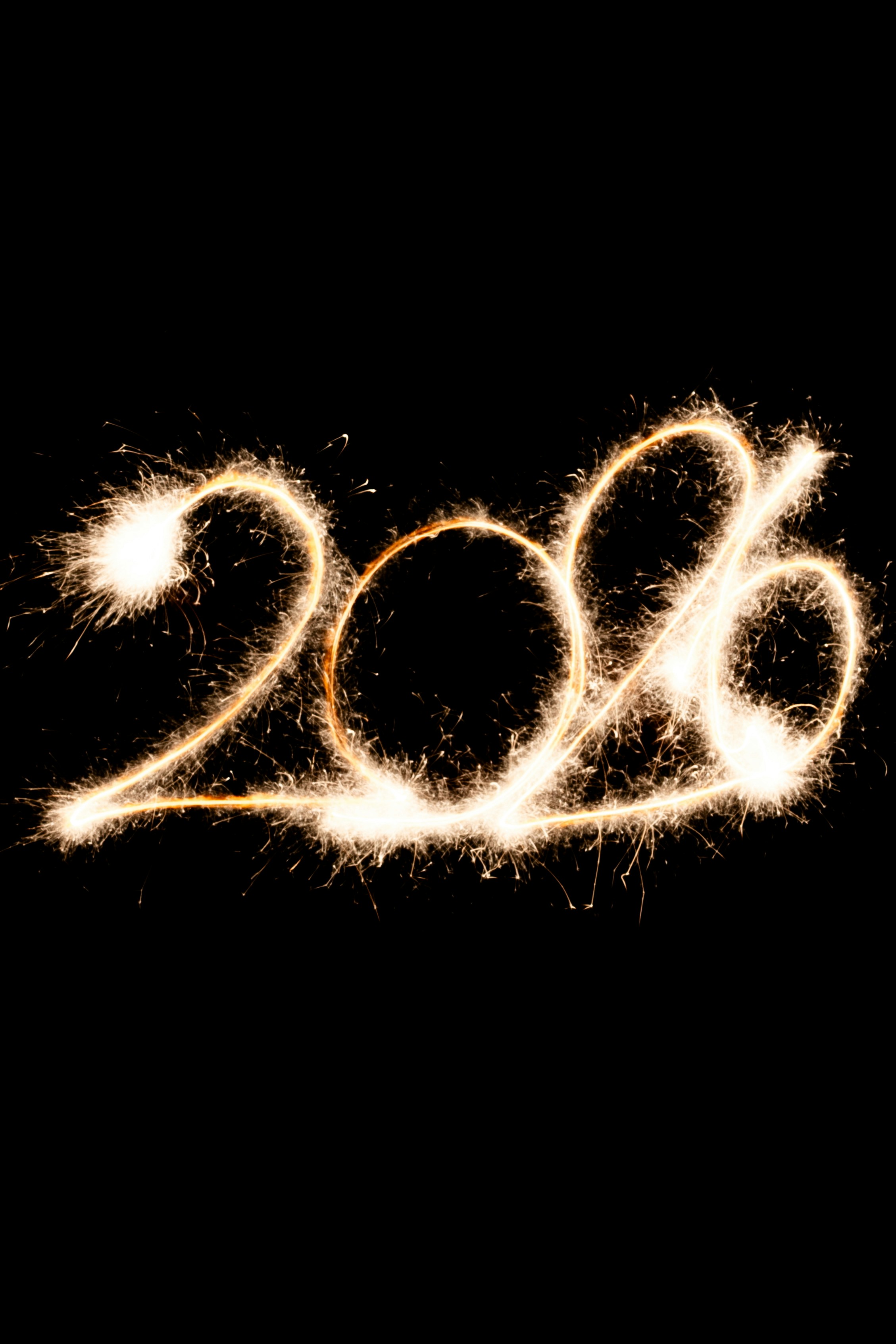 Sparklers form the number 2016 on a black background.