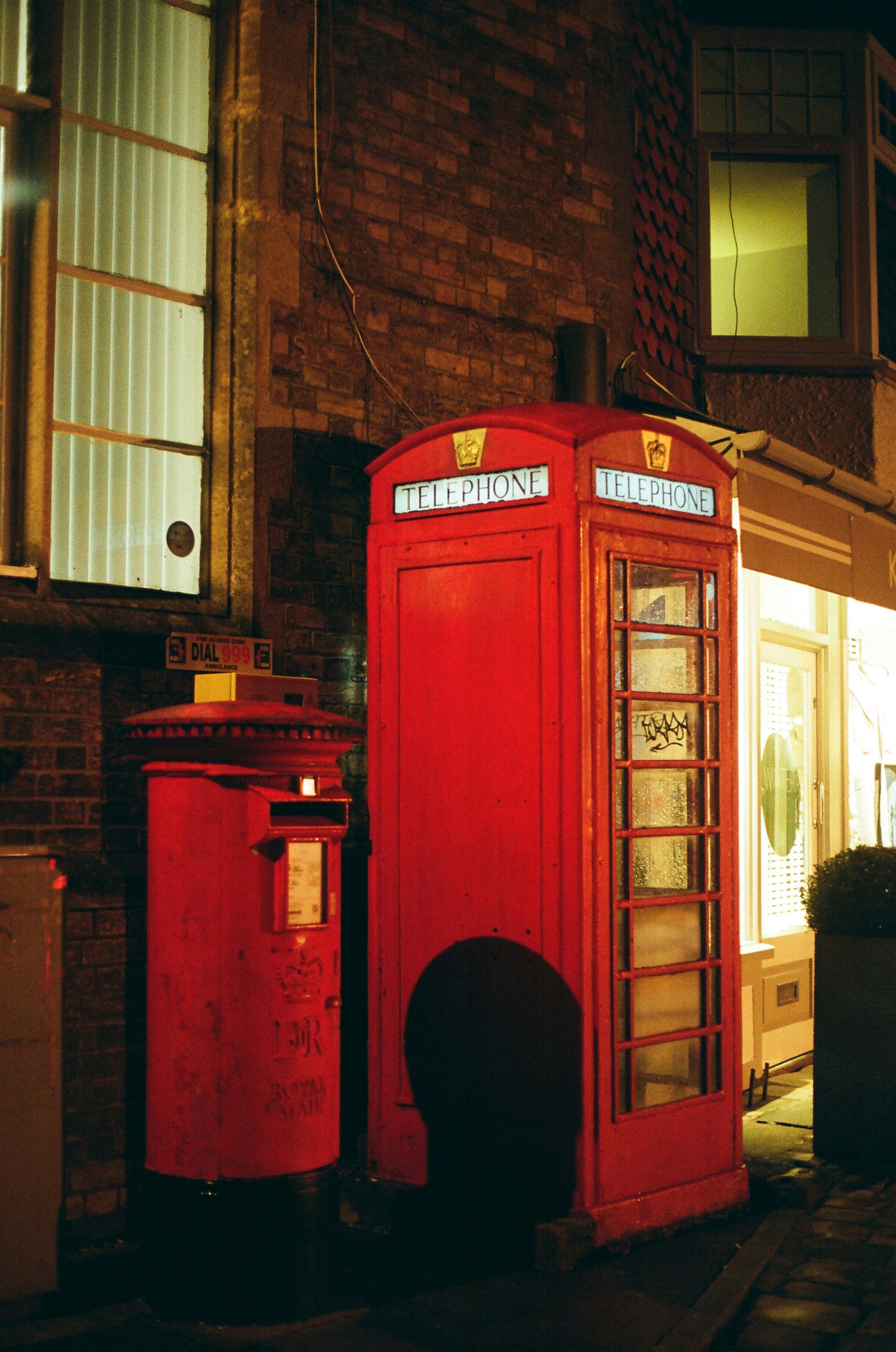 Red telephone box and post box at night photo – Free Night Image on ...