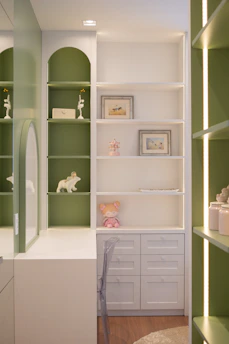 Modern shelving unit with decorative items and drawers