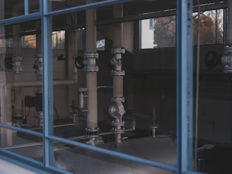 Industrial pipes and machinery inside a facility