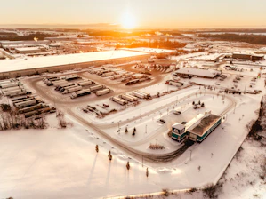 Industrial park covered in snow at sunrise
