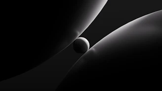 A small sphere resting between two curved surfaces