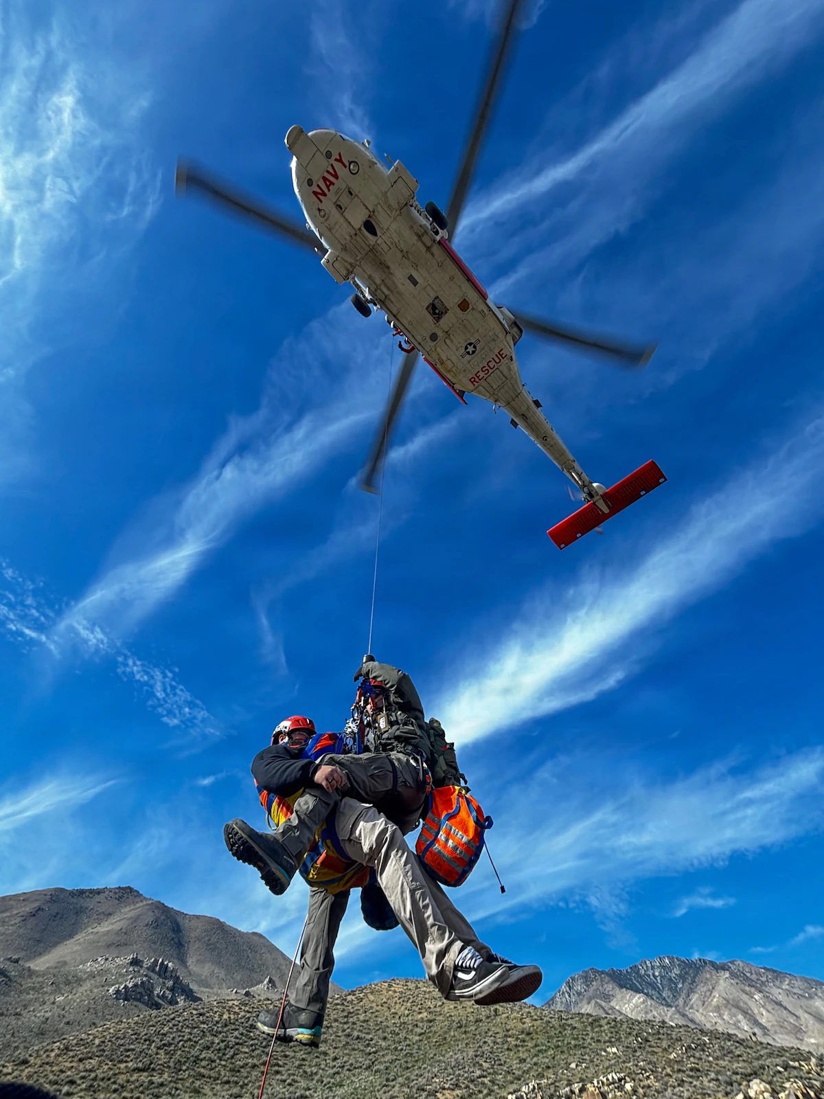 Search and rescue team working in rugged terrain