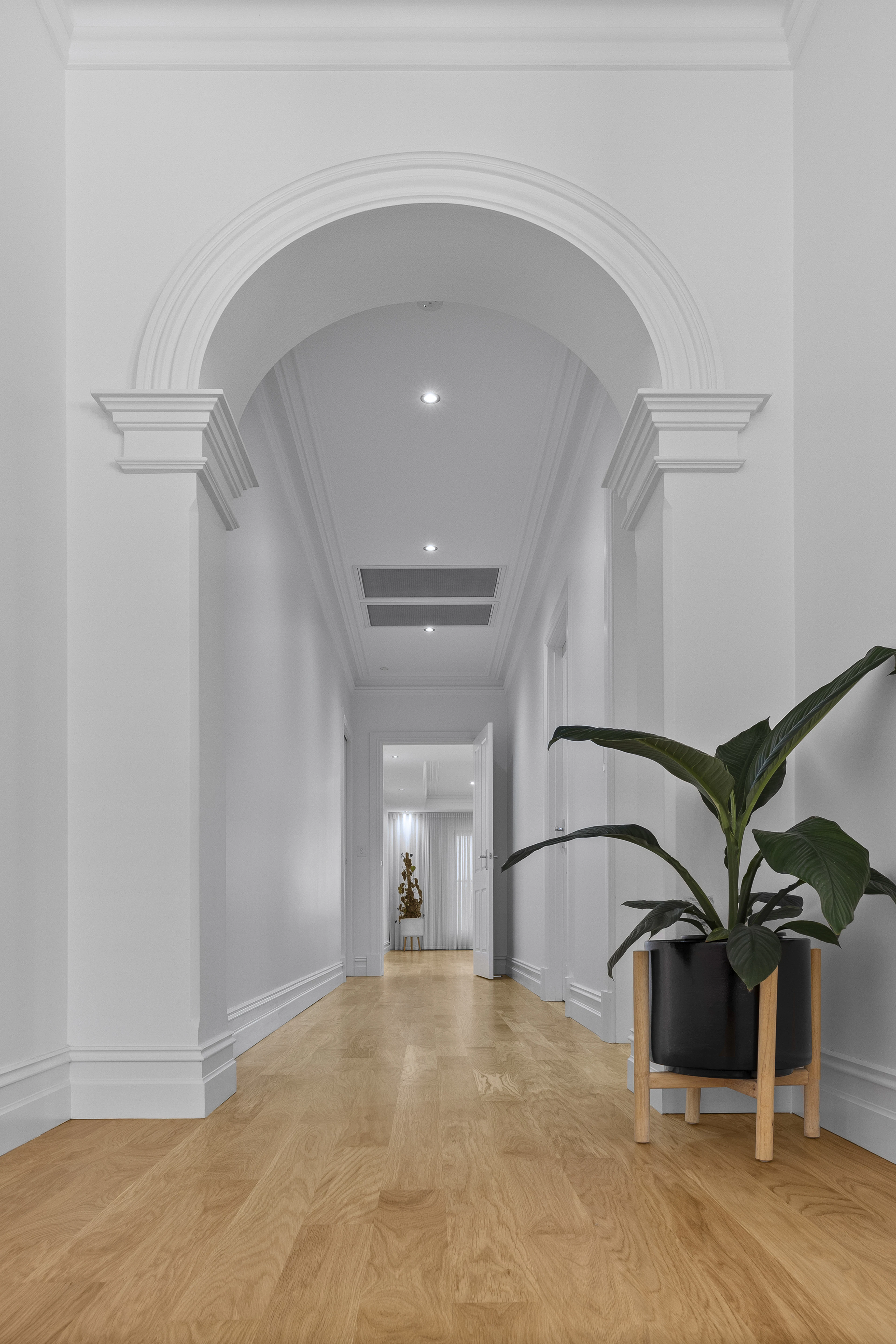Skirting board along a floor