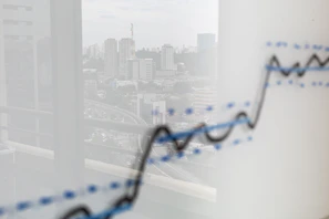 City skyline reflected on a graph