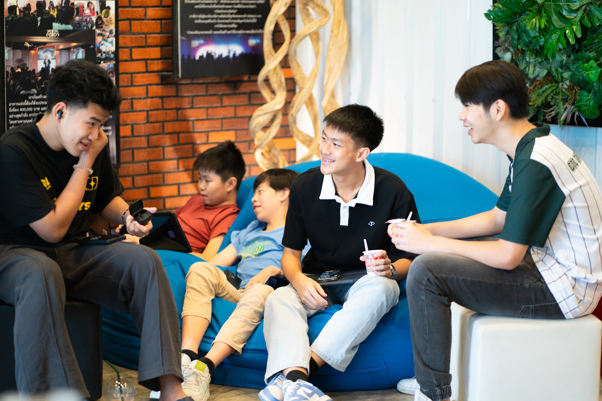 Group of young people relaxing and talking together