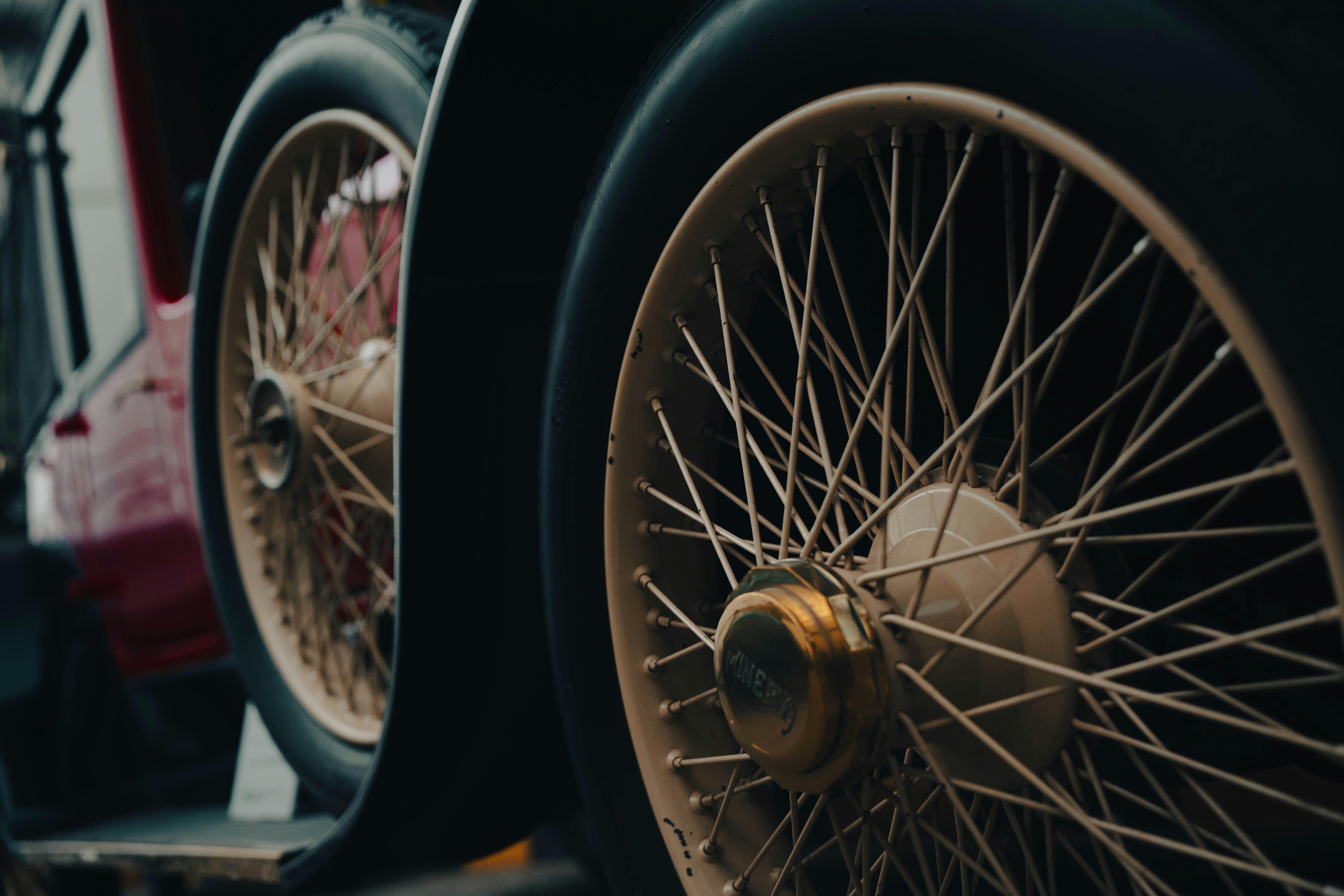 Close-up of vintage car wheels with spokes