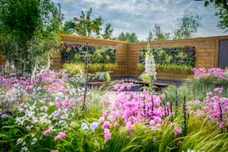 A lush garden with pink and white flowers