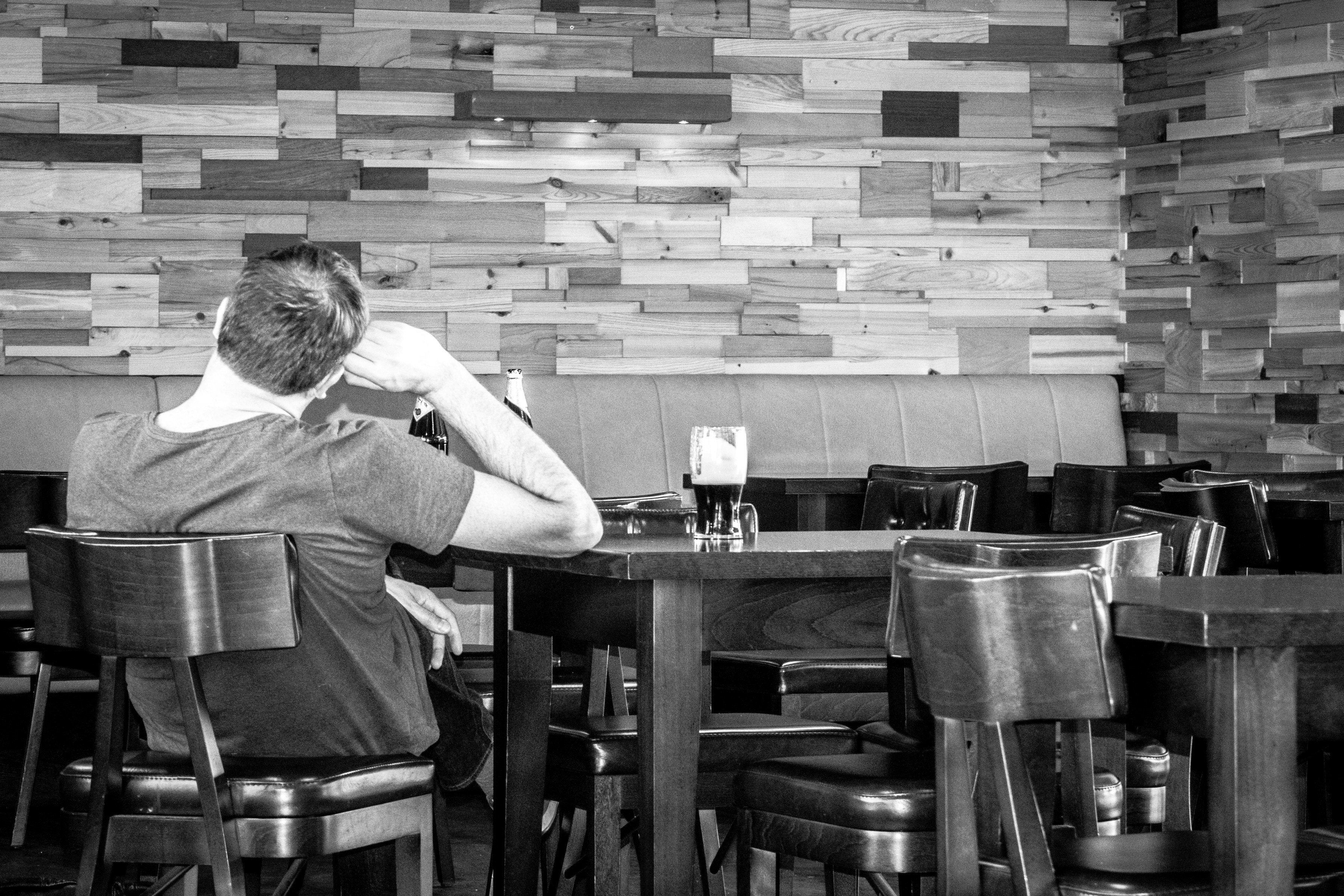 Man sitting alone at a restaurant table