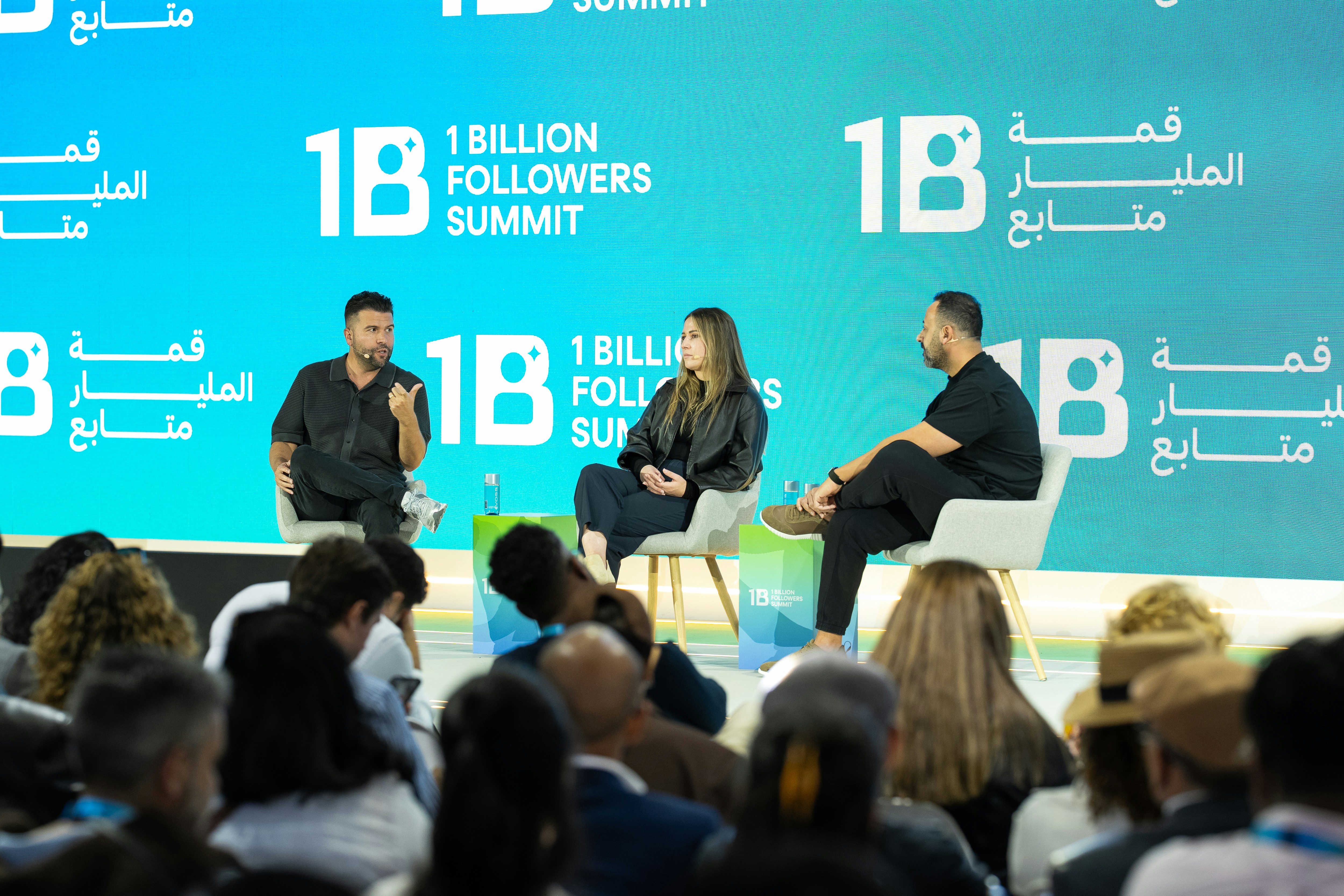 Expert exchange session at a global creator summit featuring Carlos Gil in conversation about personal branding, content systems, and monetization paths for creators and founders building sustainable digital businesses.