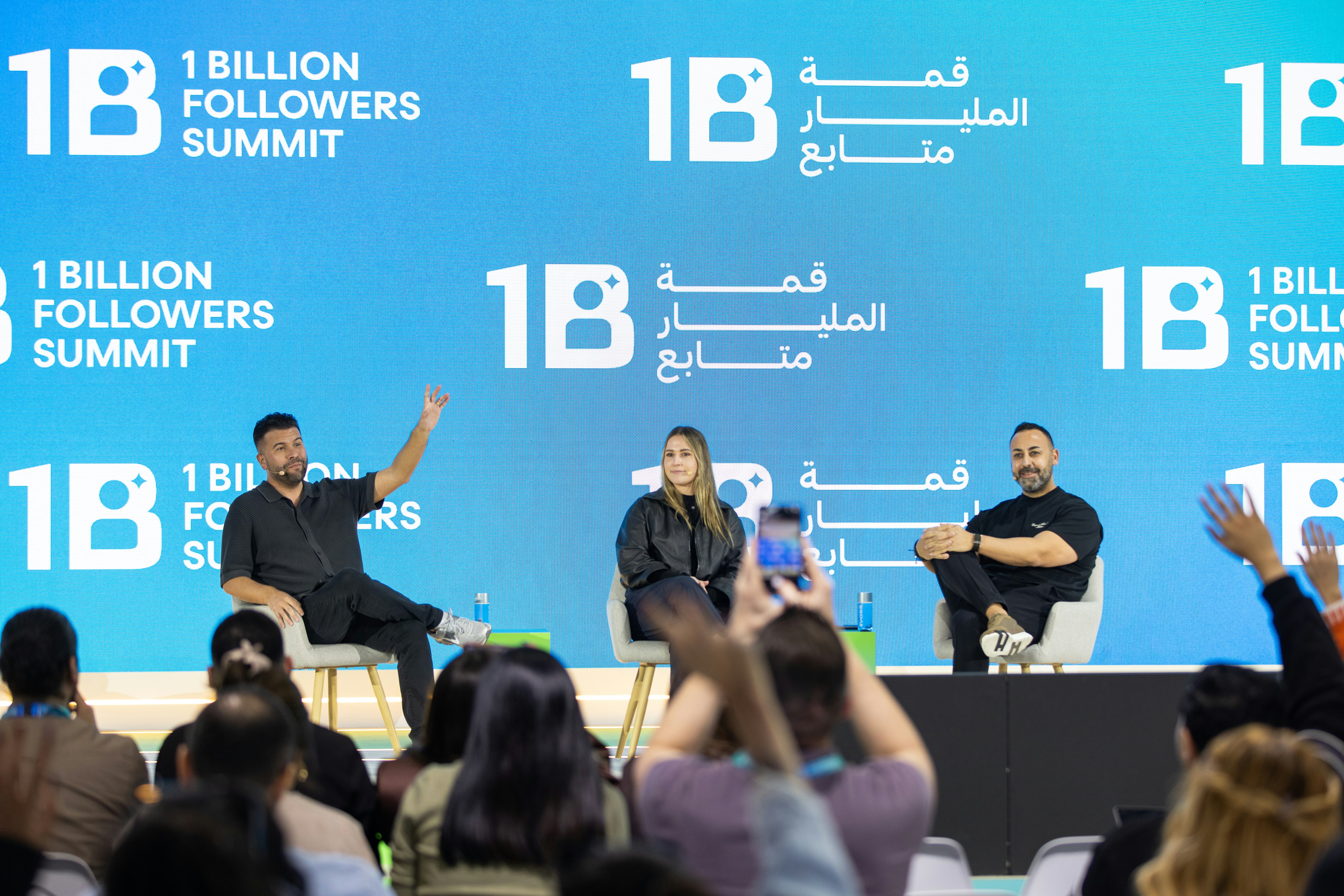 Conference session titled “Building a Billion-Dollar Personal Brand,” featuring Carlos Gil and industry experts discussing how to define positioning, build trust, and monetize influence beyond social media platforms.