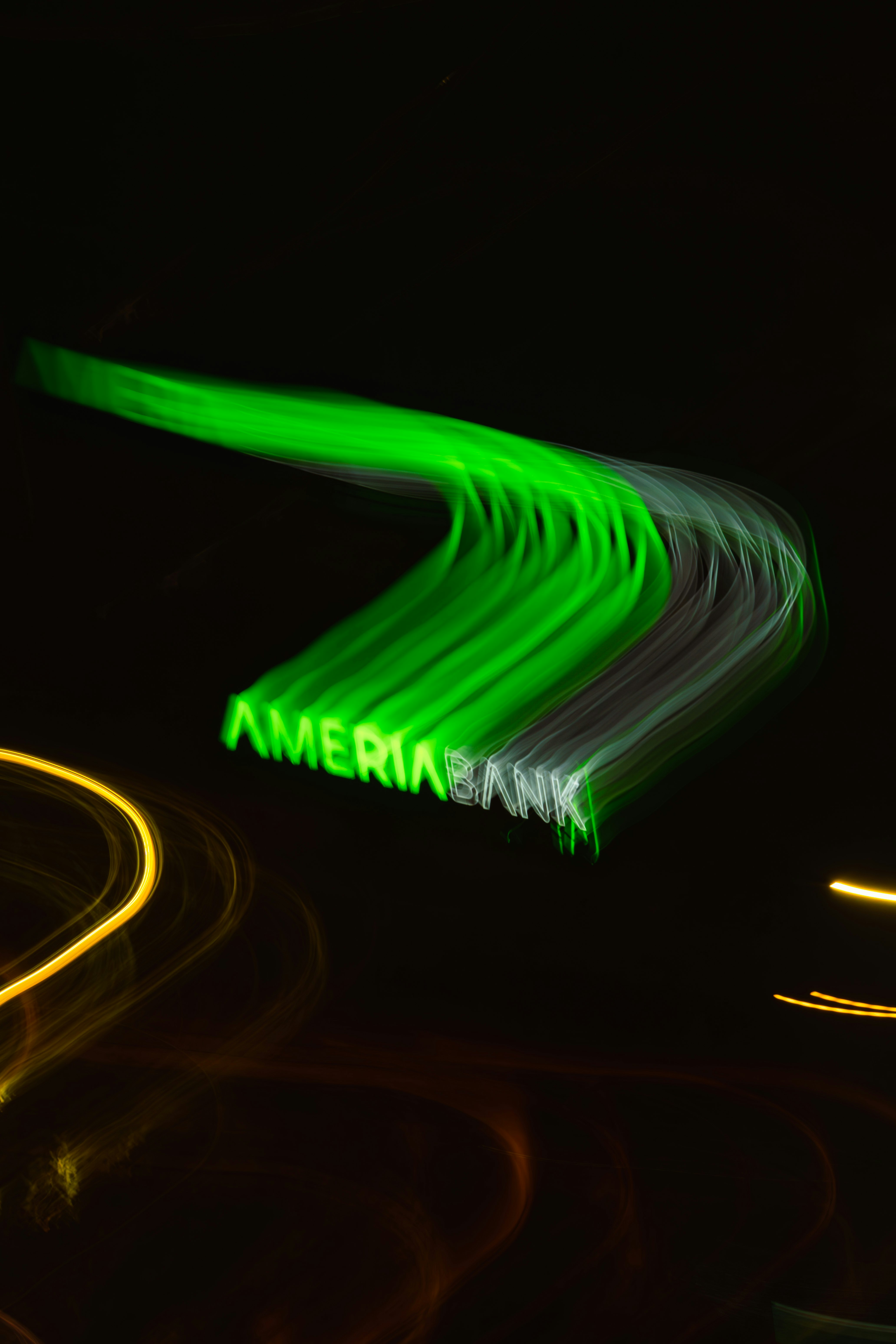 Green neon sign for ameriabank at night