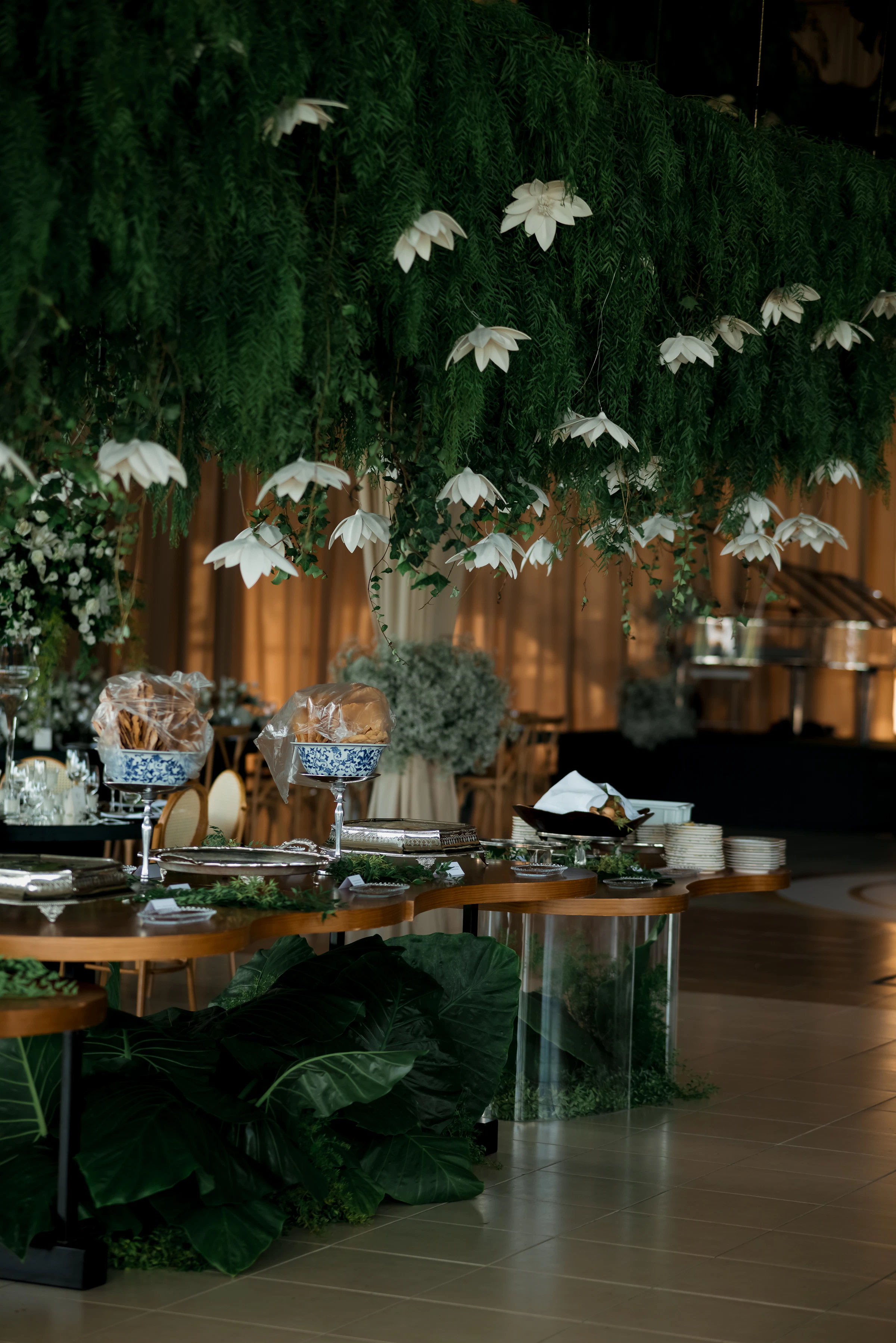 Elegant wedding catering buffet with food, florals and reception styling