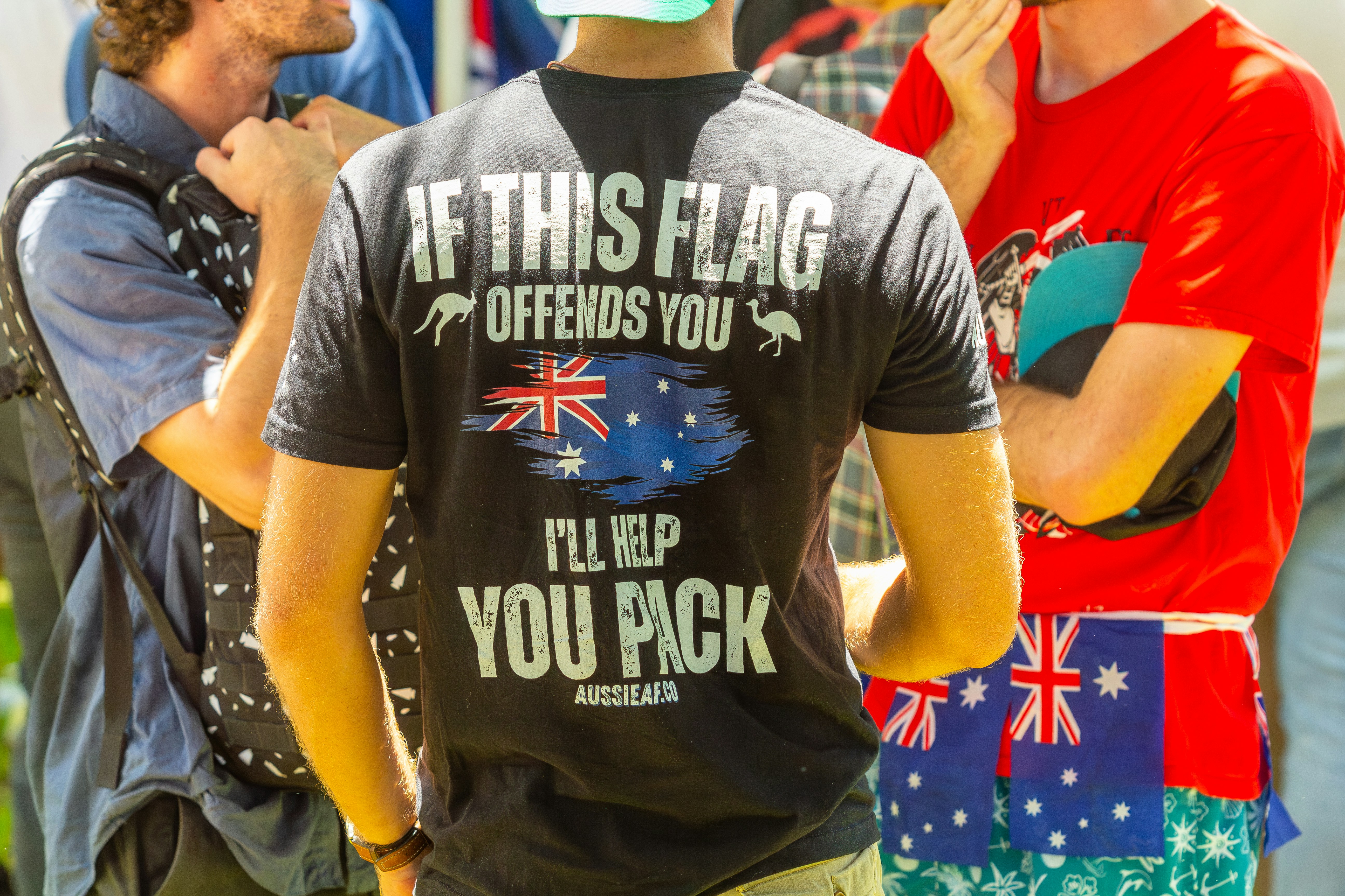 Man wearing shirt with australian flag and patriotic slogan