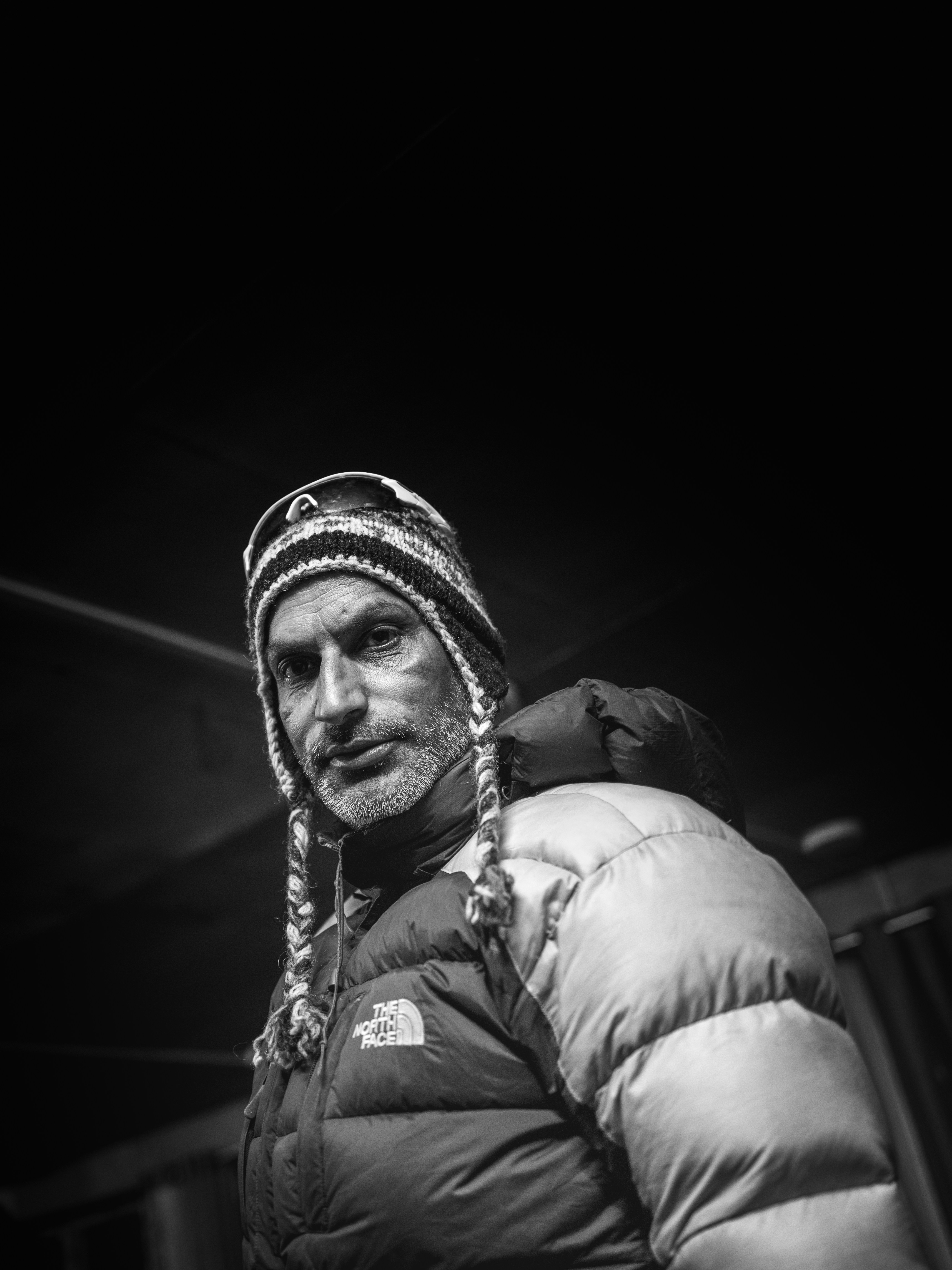 Man wearing a beanie and puffer jacket