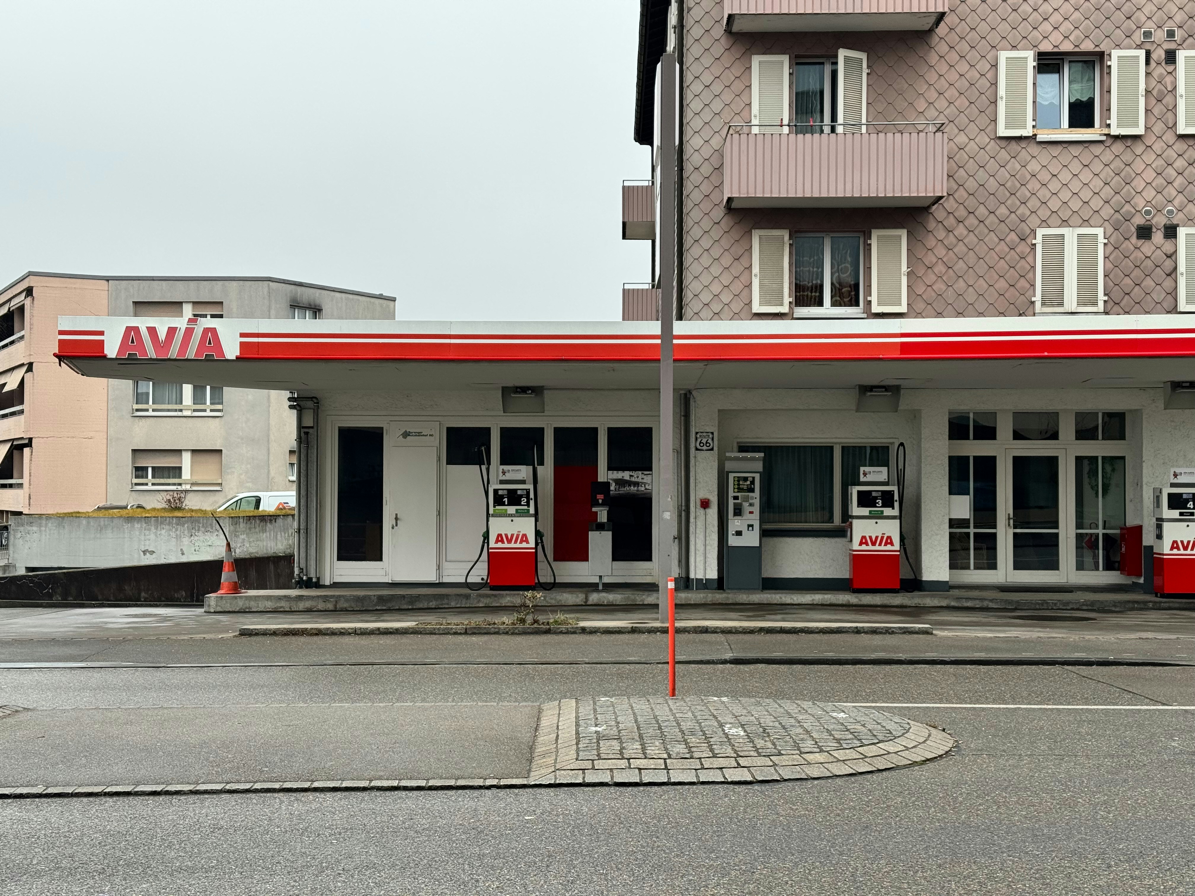 Avia gas station with red and white accents