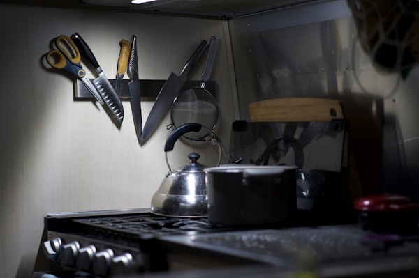 Chef knives stored on a magnetic wall strip
