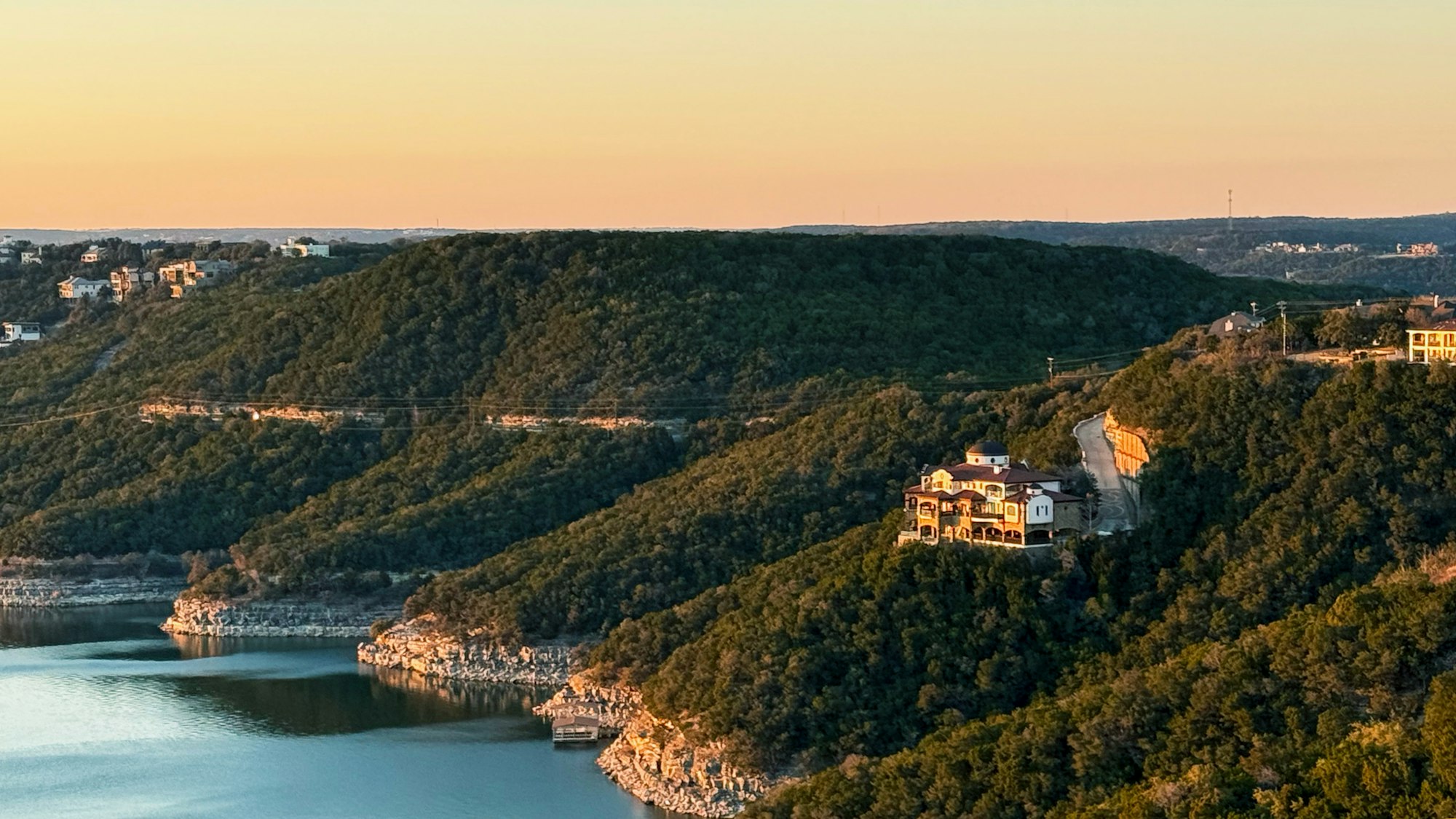 Texas Hill Country hills over a calm lake