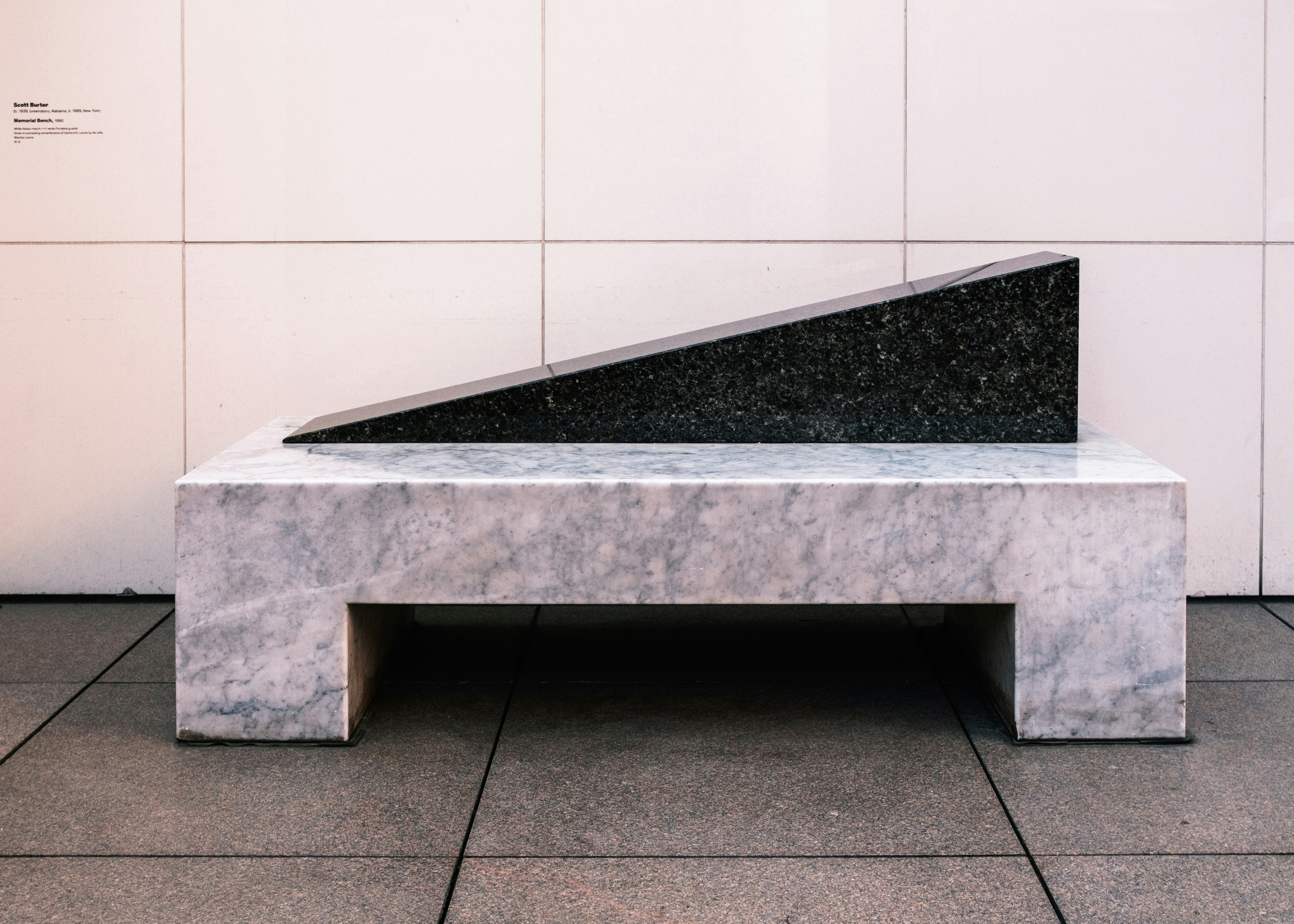 Modern abstract sculpture on marble bench