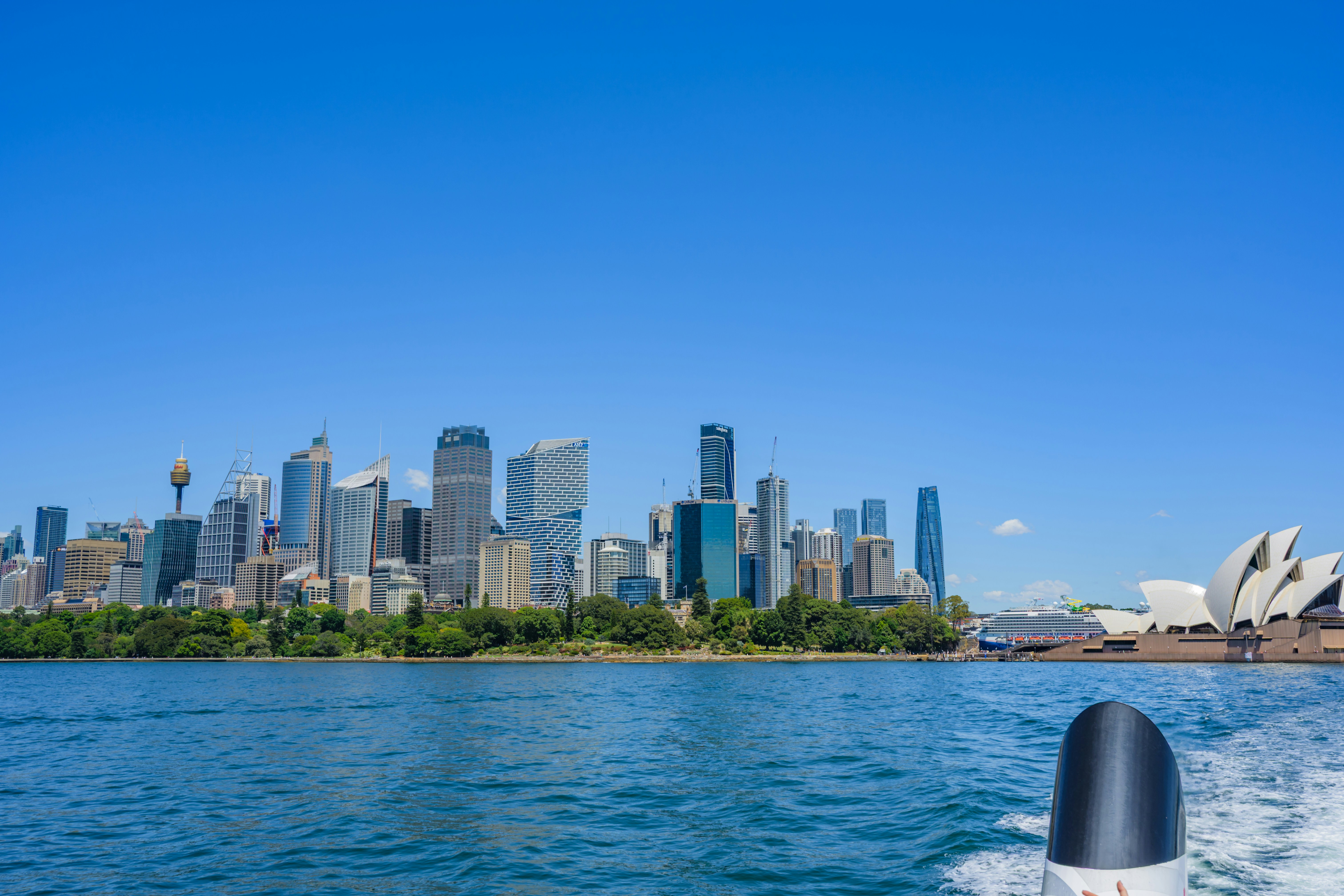 Sydney skyline with opera house and blue sky