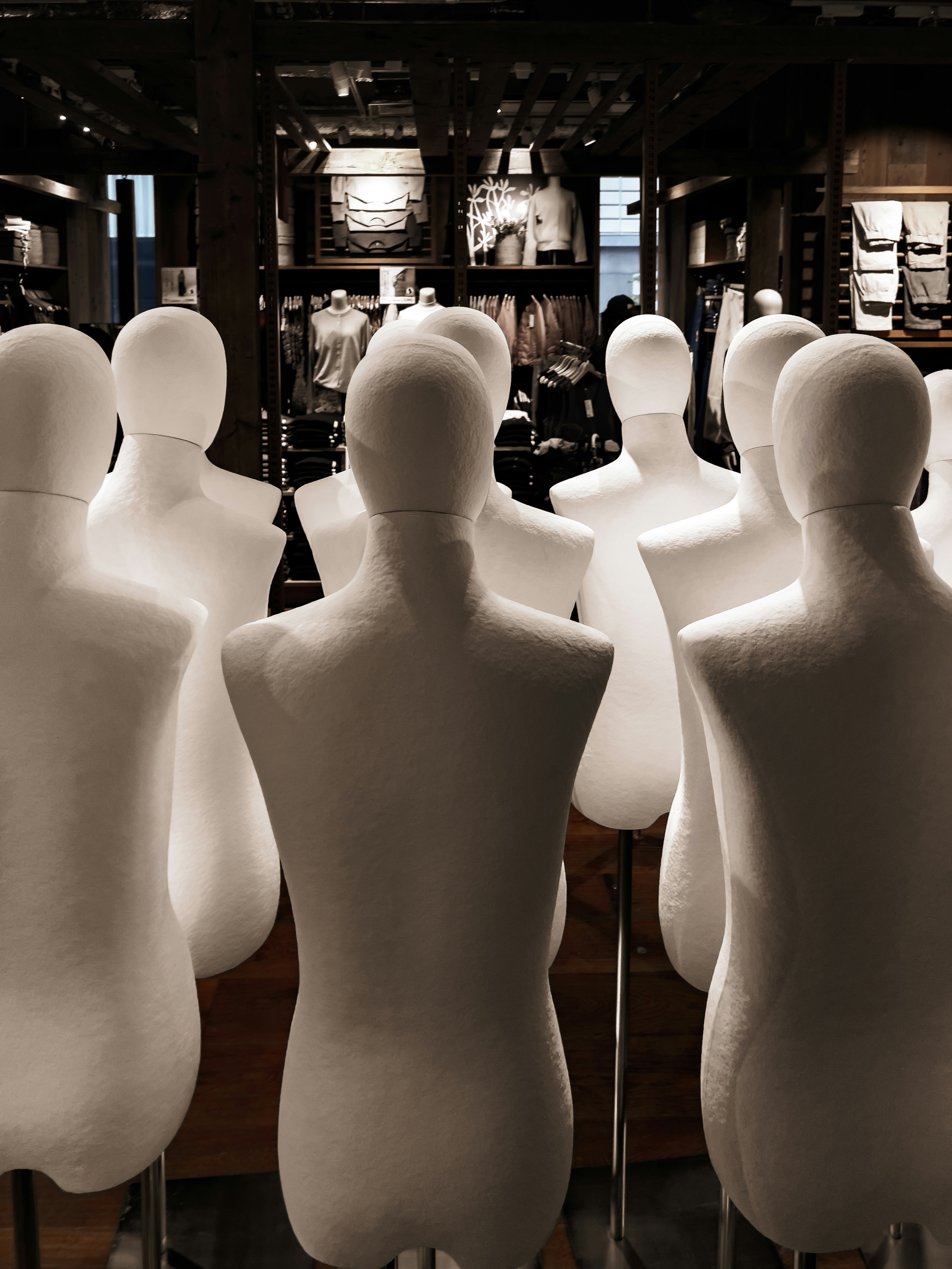 Mannequins grouped together in a store display.