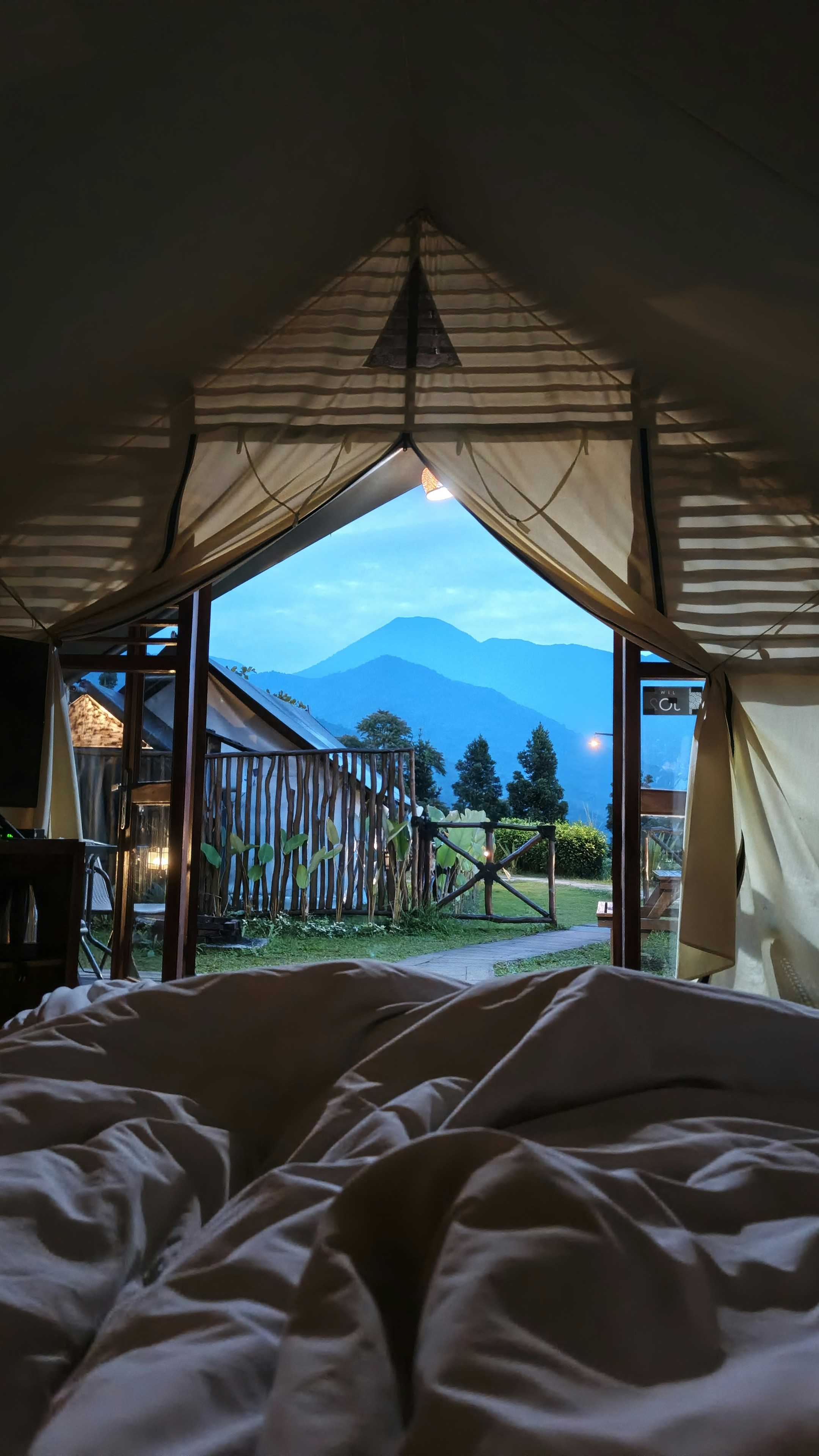 View of mountains from inside a tent