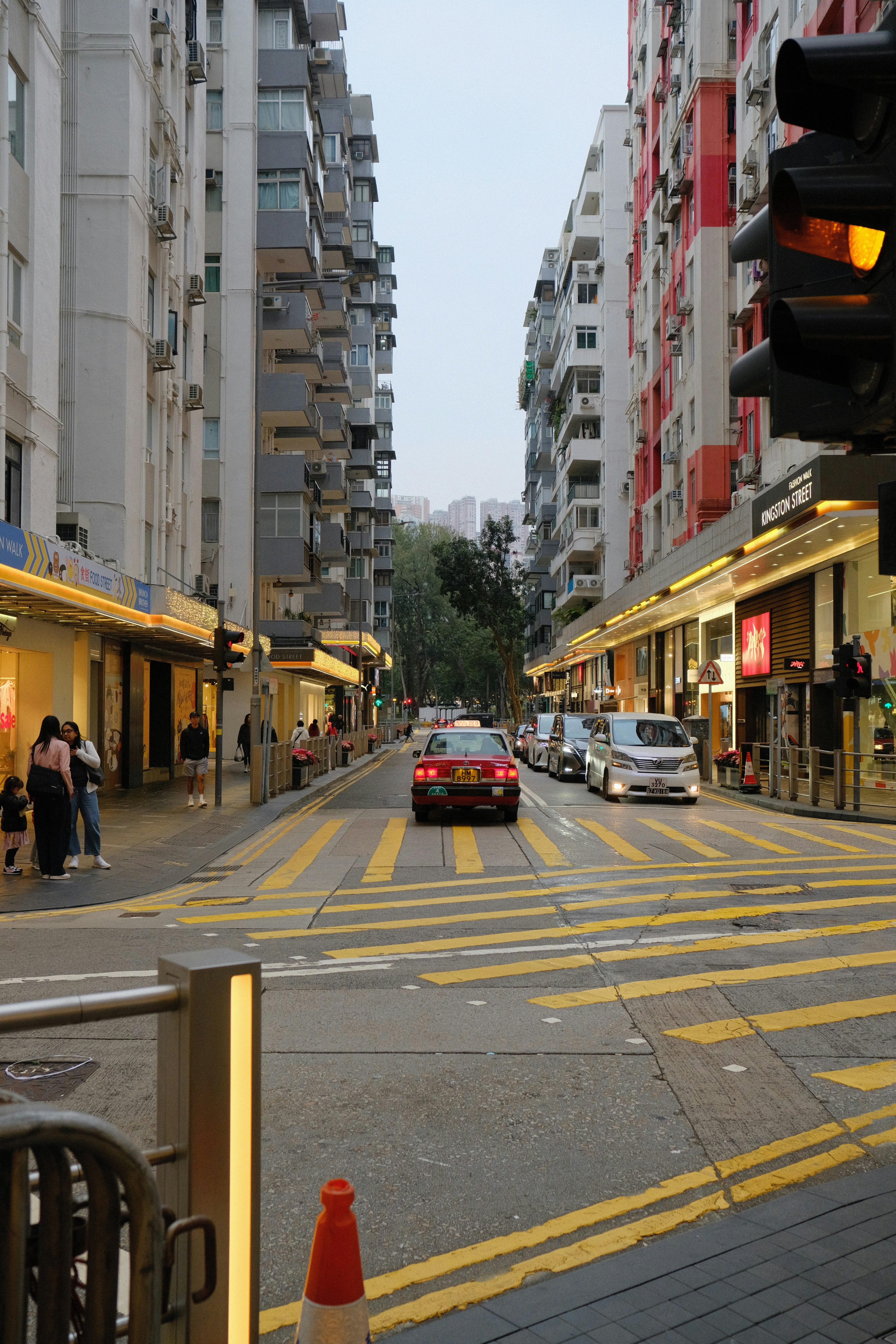 City street with traffic and pedestrians