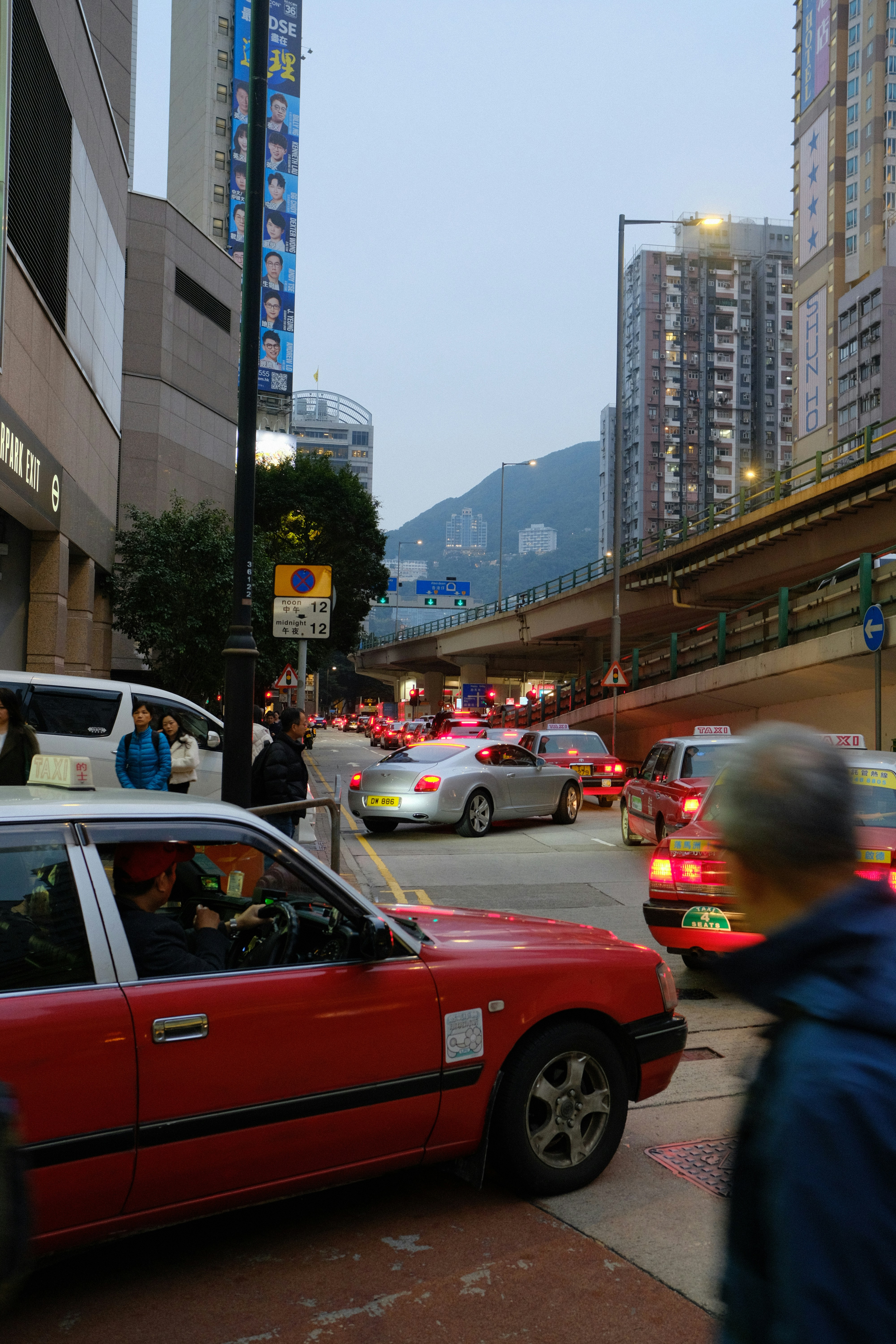 Busy city street with traffic and tall buildings
