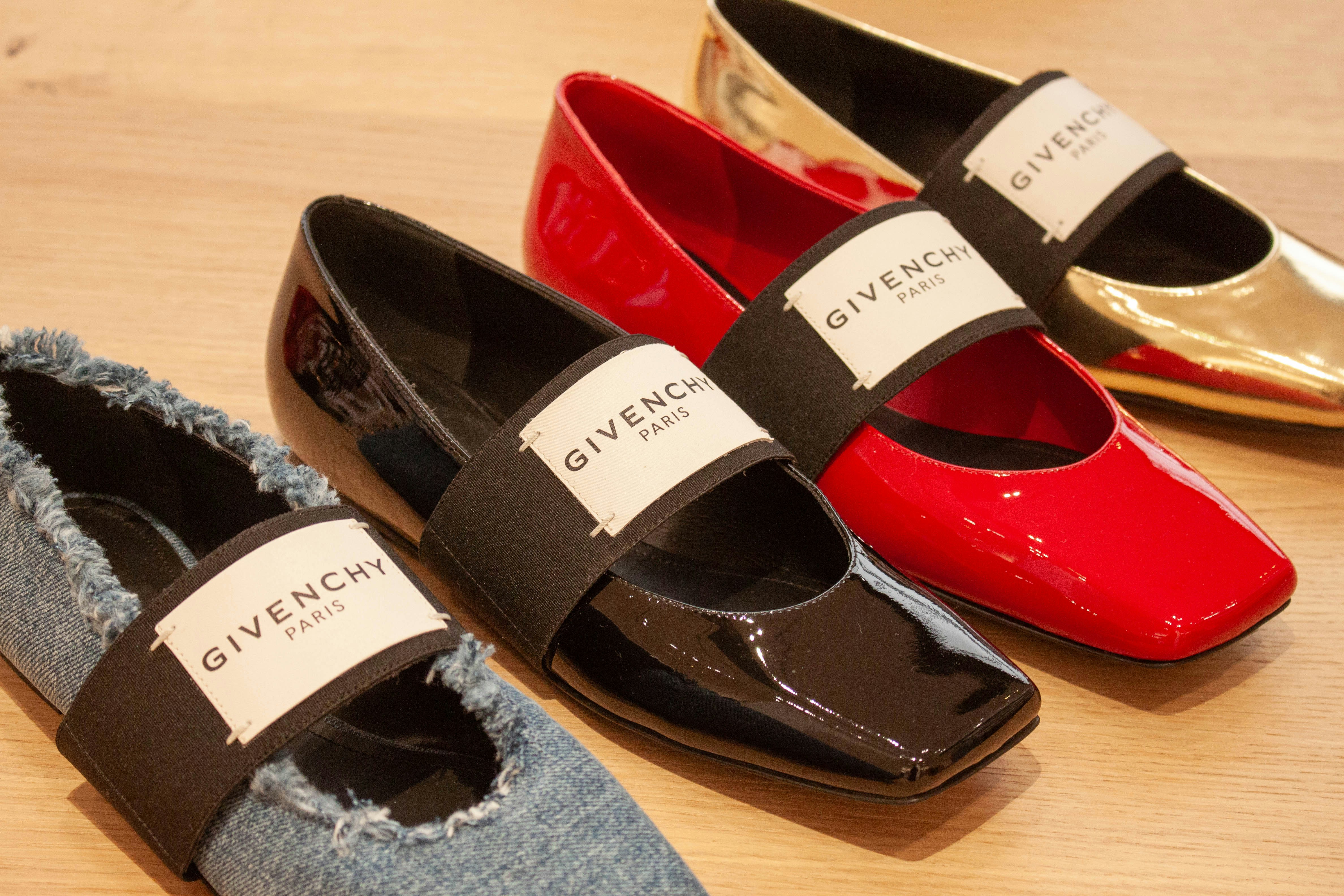 Four designer flat shoes in different colors
