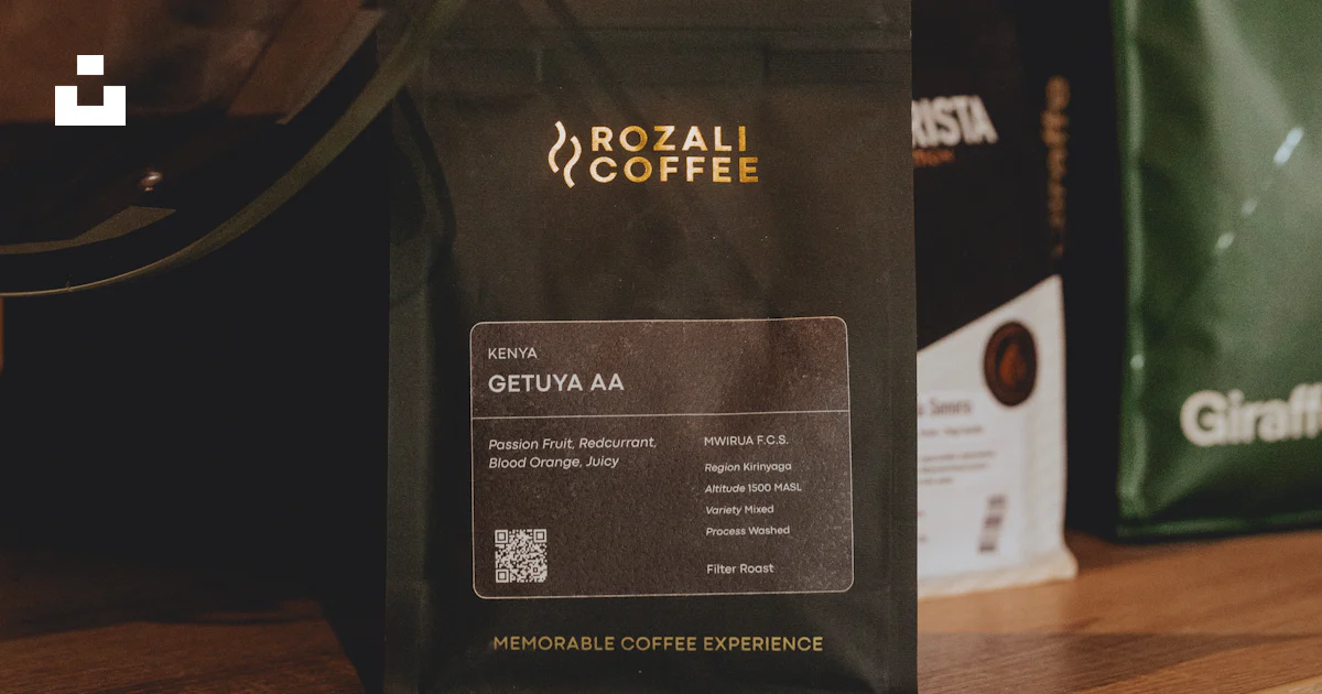 Maco Rozali A bag of rozali coffee with coffee beans in background. photo – Free ...
