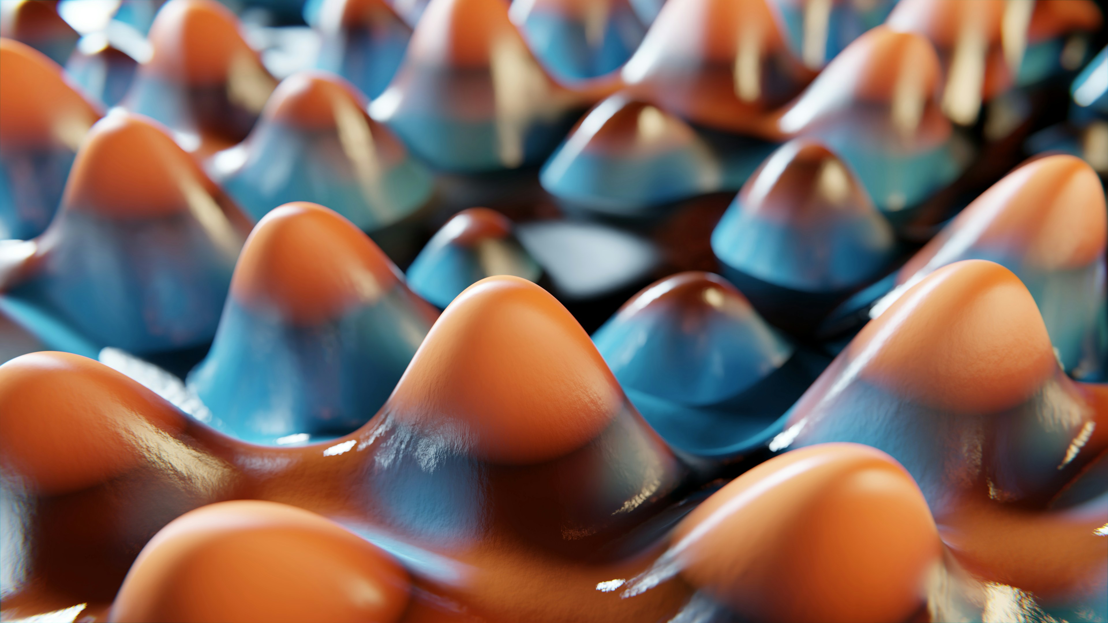 オレンジと青のこぶの抽象的な模様