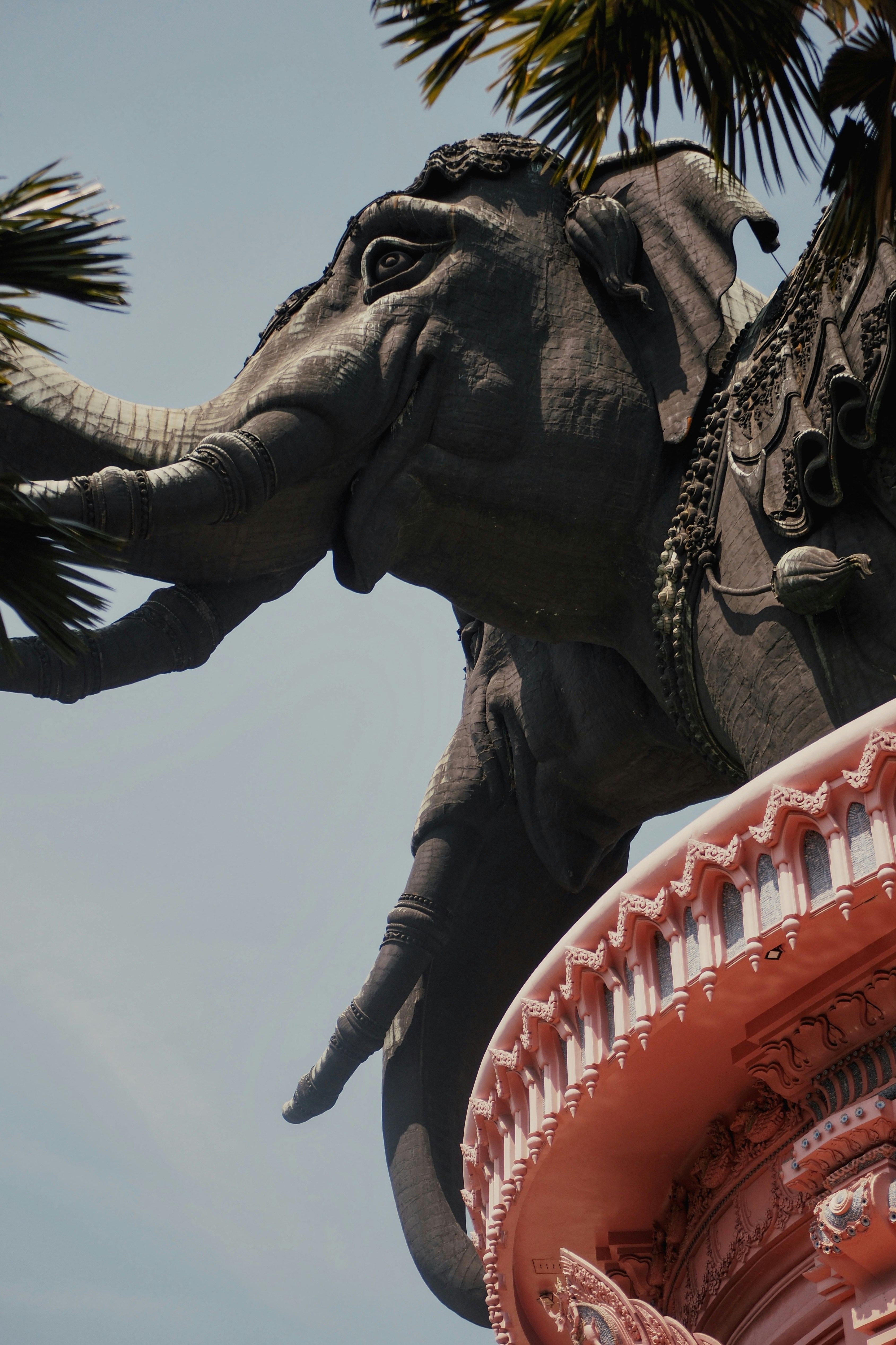 A large elephant statue decorated with ornate carvings.