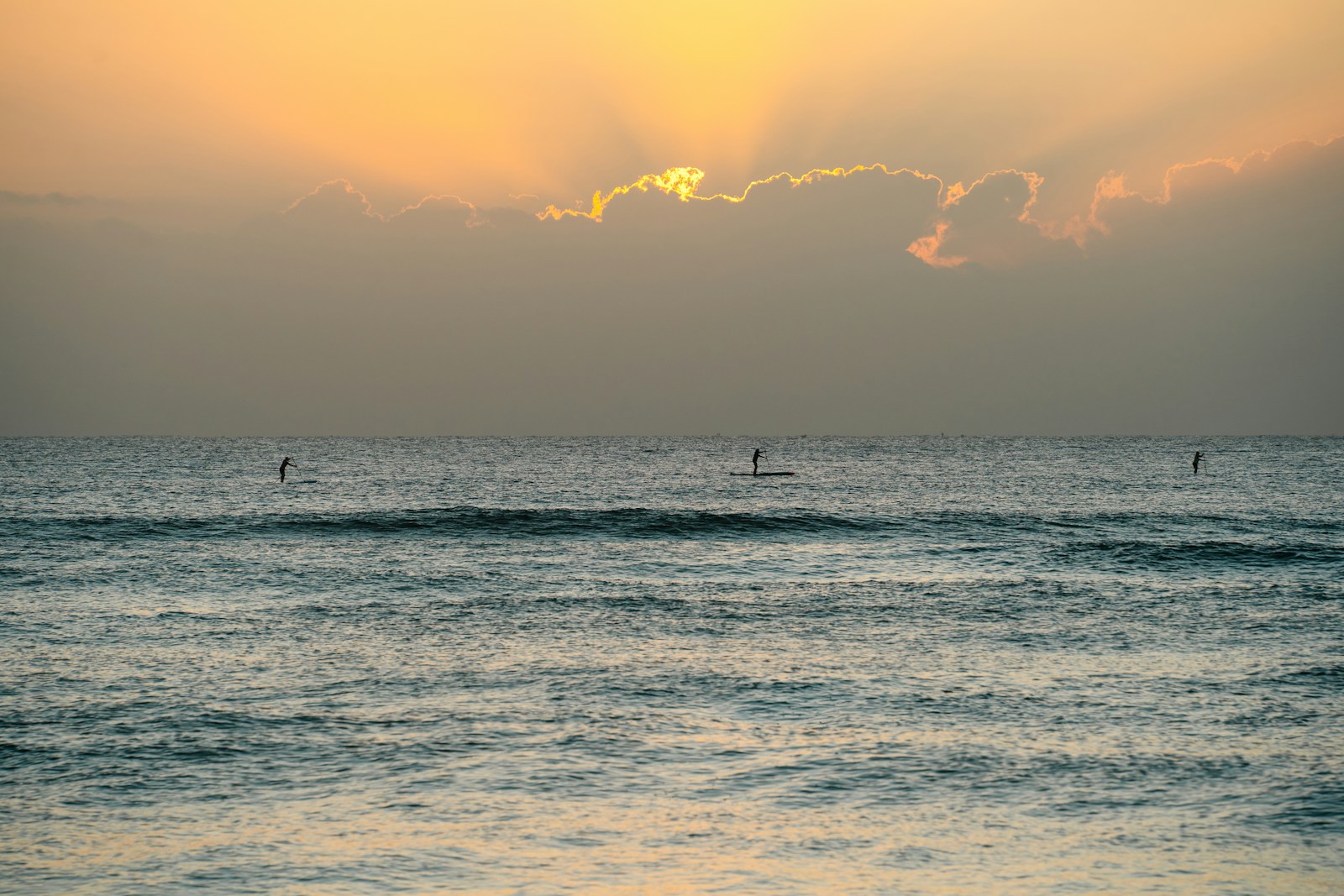 Peaceful sunrise over calm water