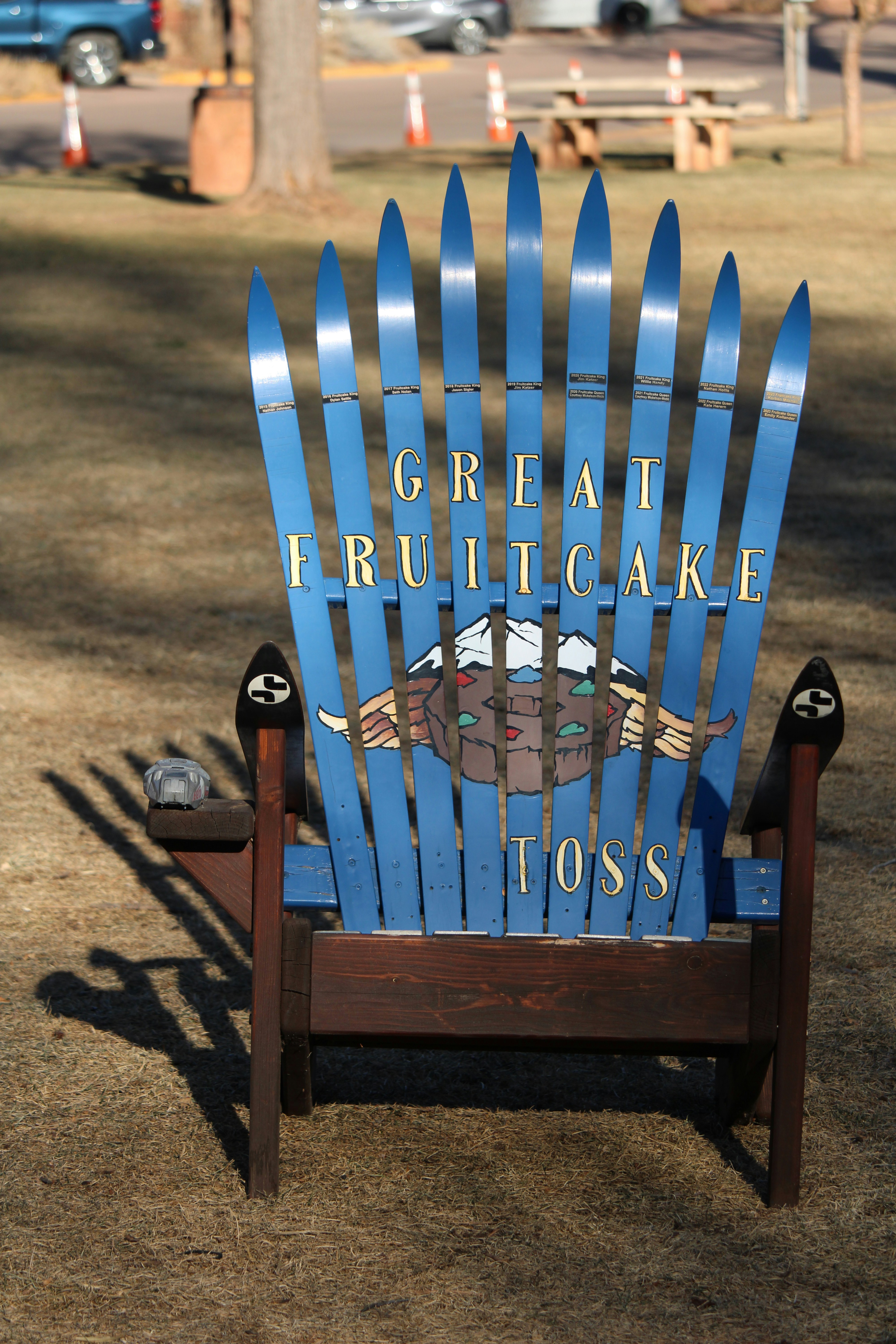 Blue chair with "great fruitcake toss" text.