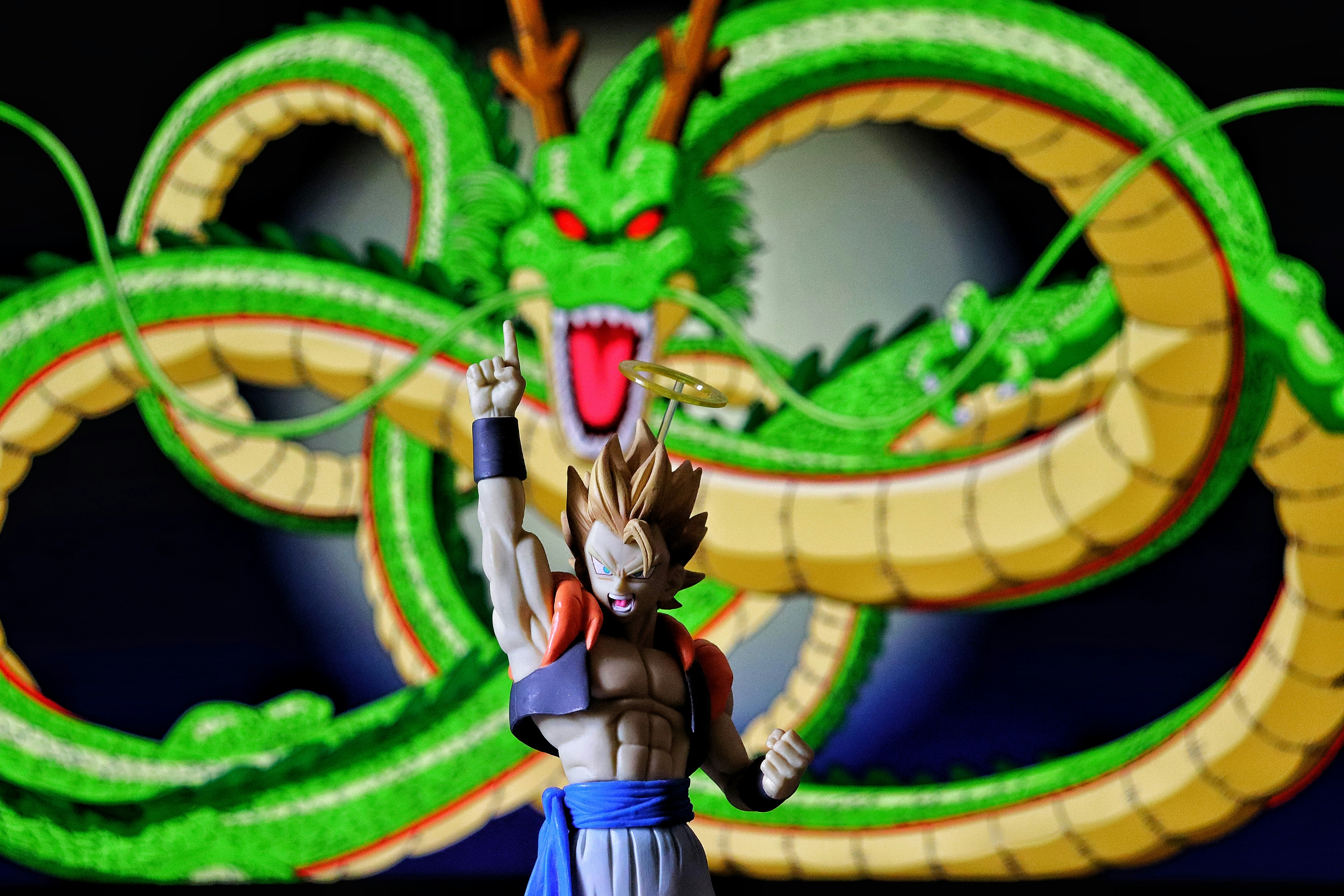 Gogeta figure with shenron dragon behind him