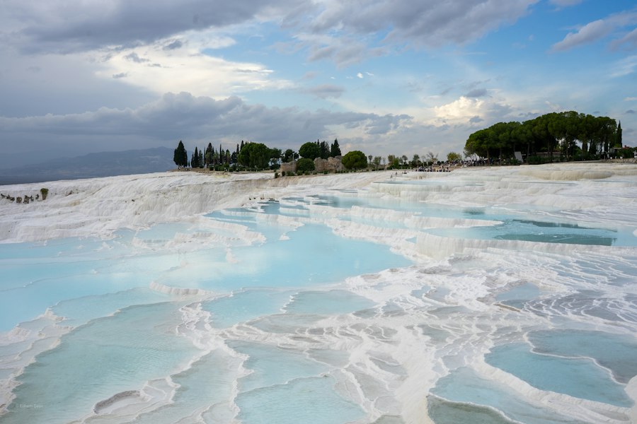 The white travertine terraces and thermal pools of Pamukkale
