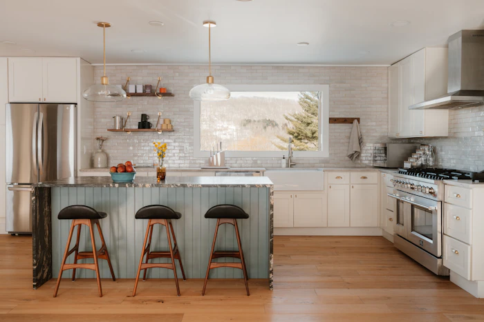 Modern kitchen remodel with island and stainless appliances