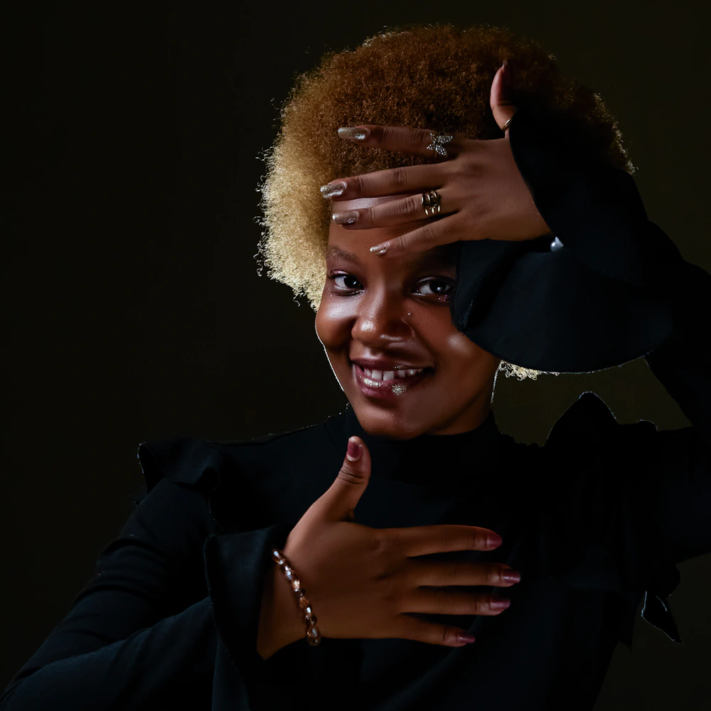 Black woman with long styled hair