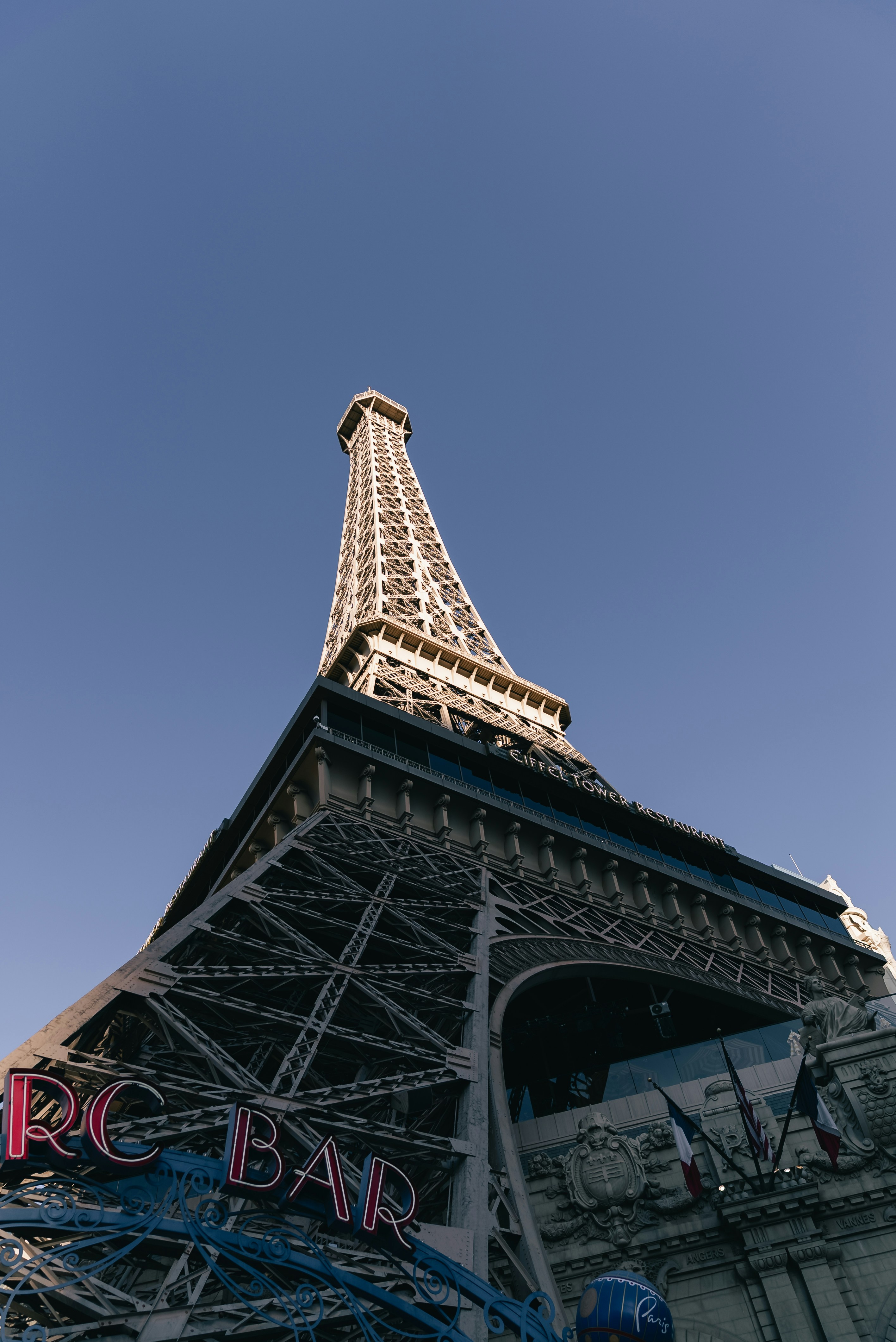 Eiffel tower replica against a clear blue sky