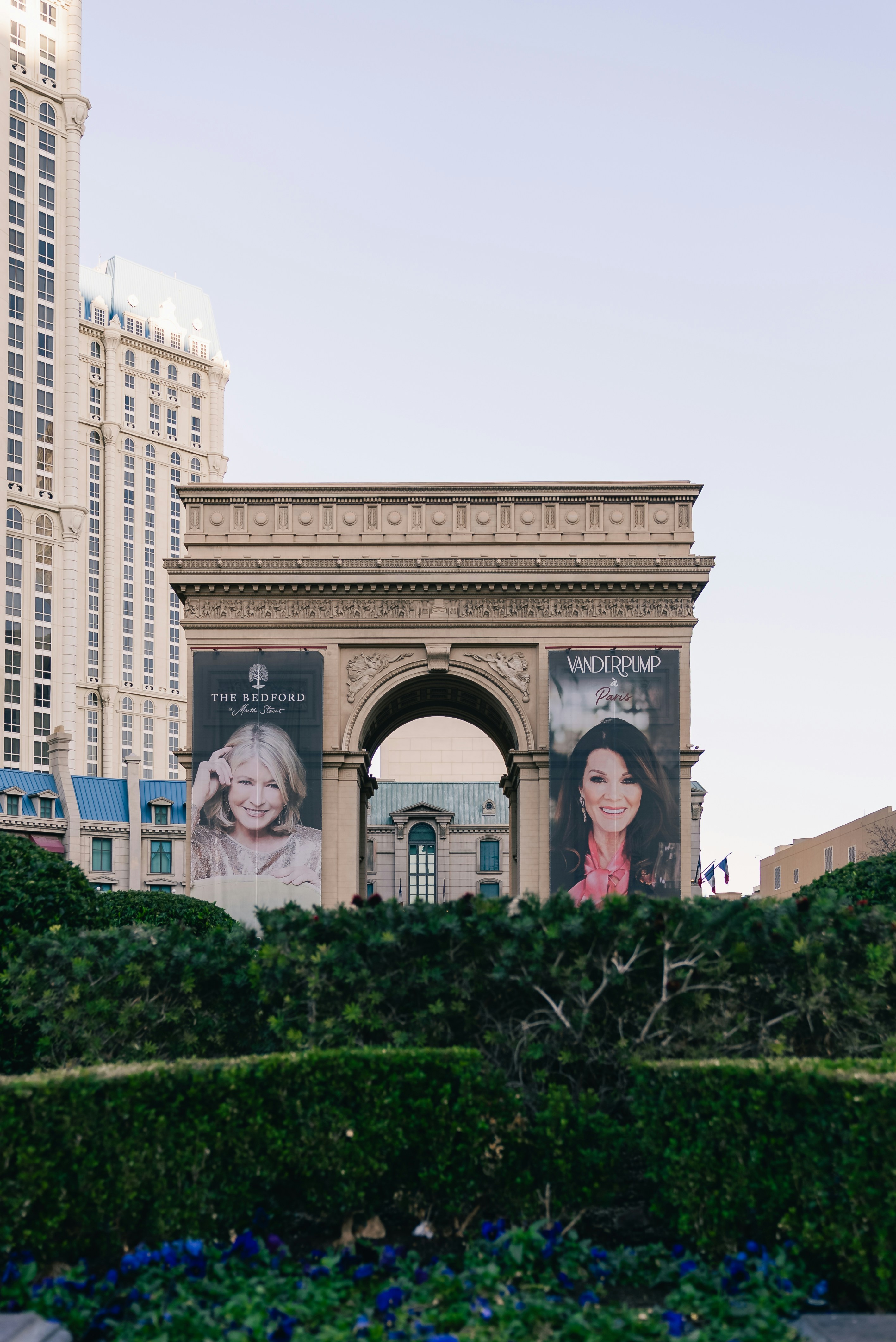 Arc de triomphe replica with large posters in las vegas
