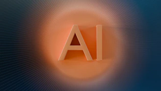 The letters ai glow with orange light.