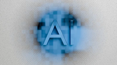 The letters ai are displayed on a blurred background.
