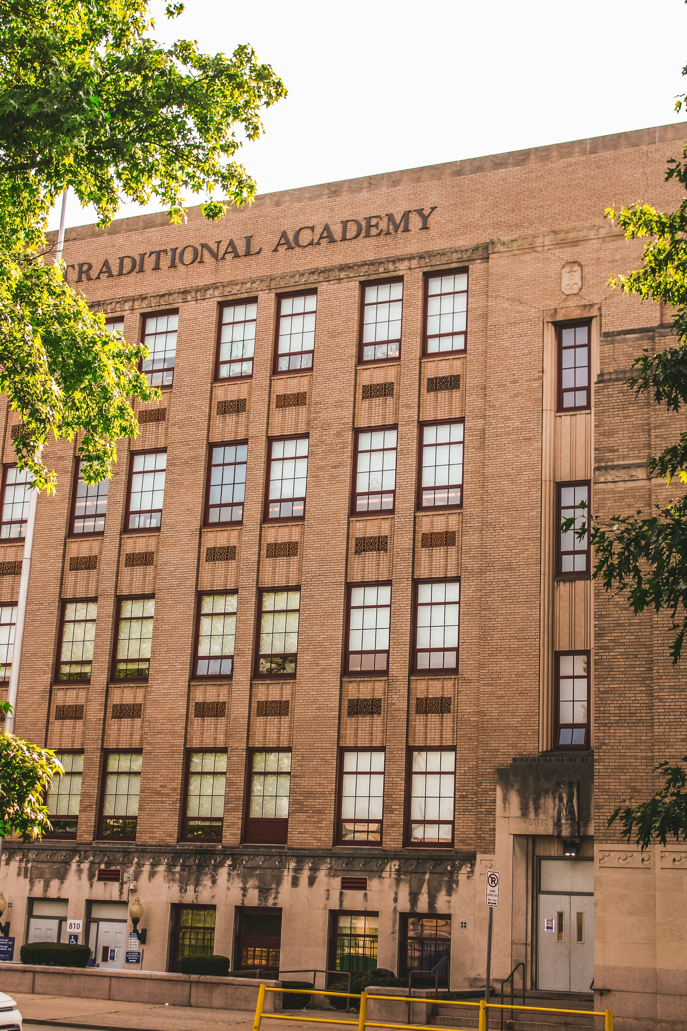 Traditional academy building with many windows