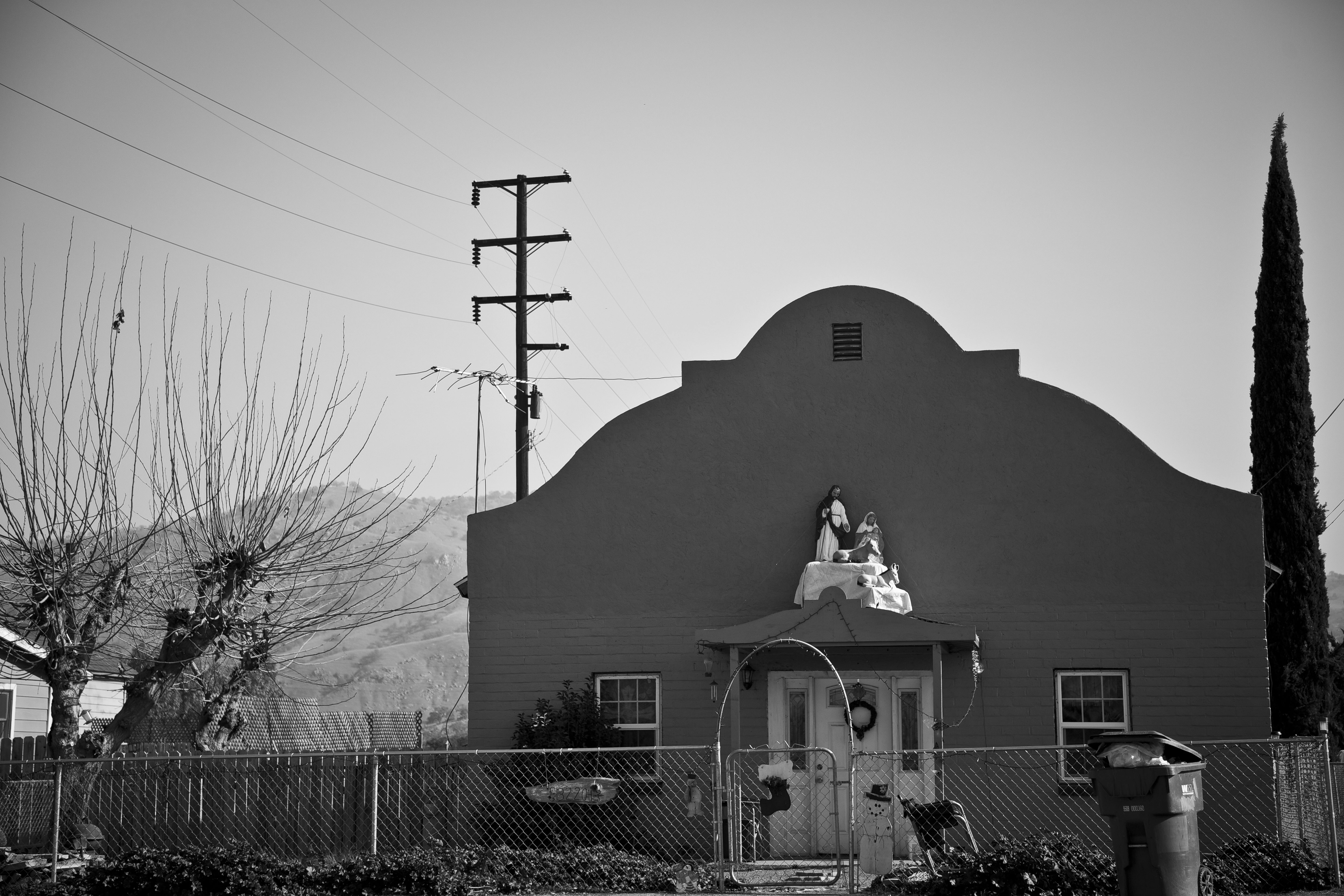 A building with a statue on its roof