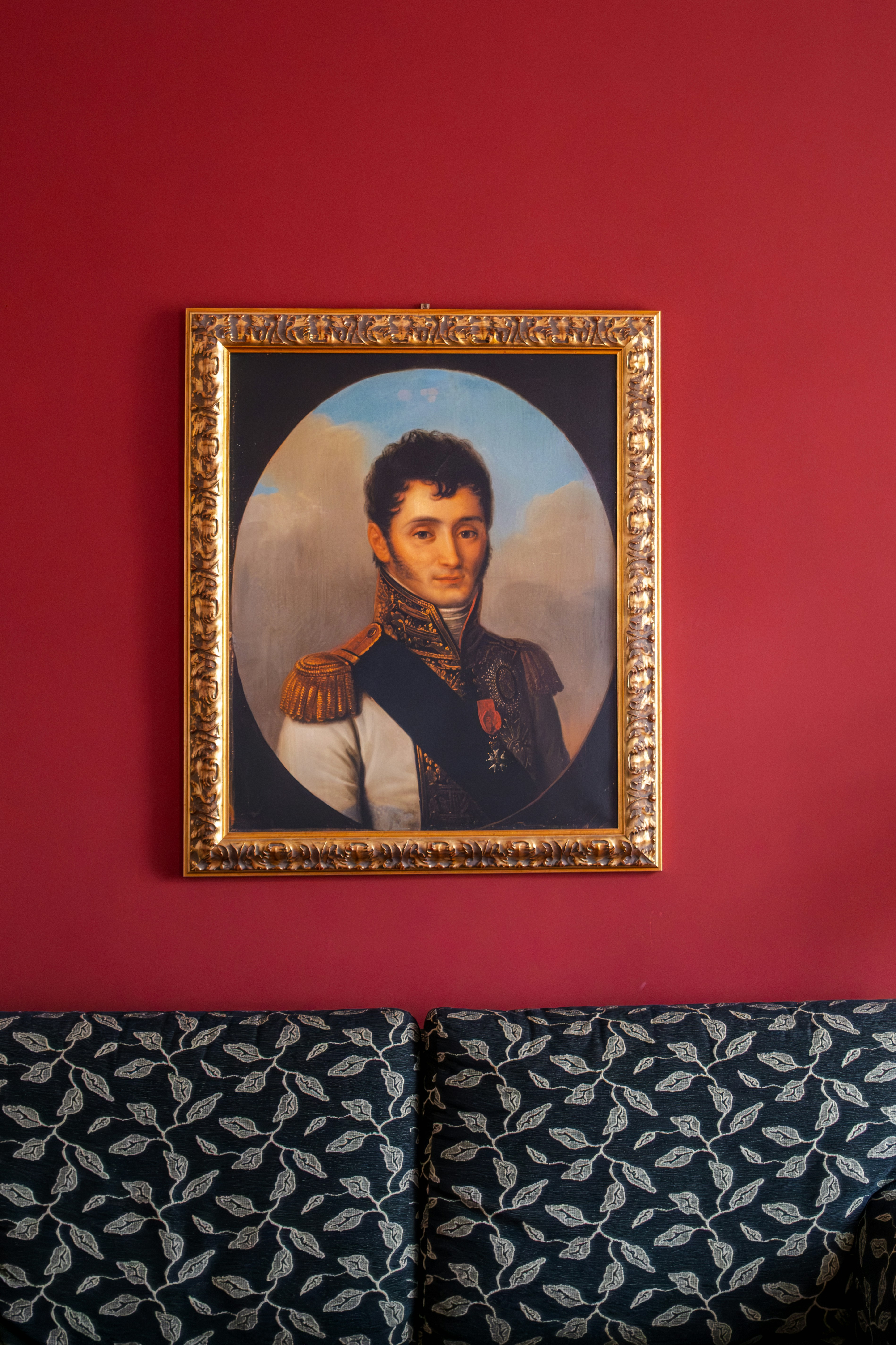 A framed portrait of a man in military uniform.