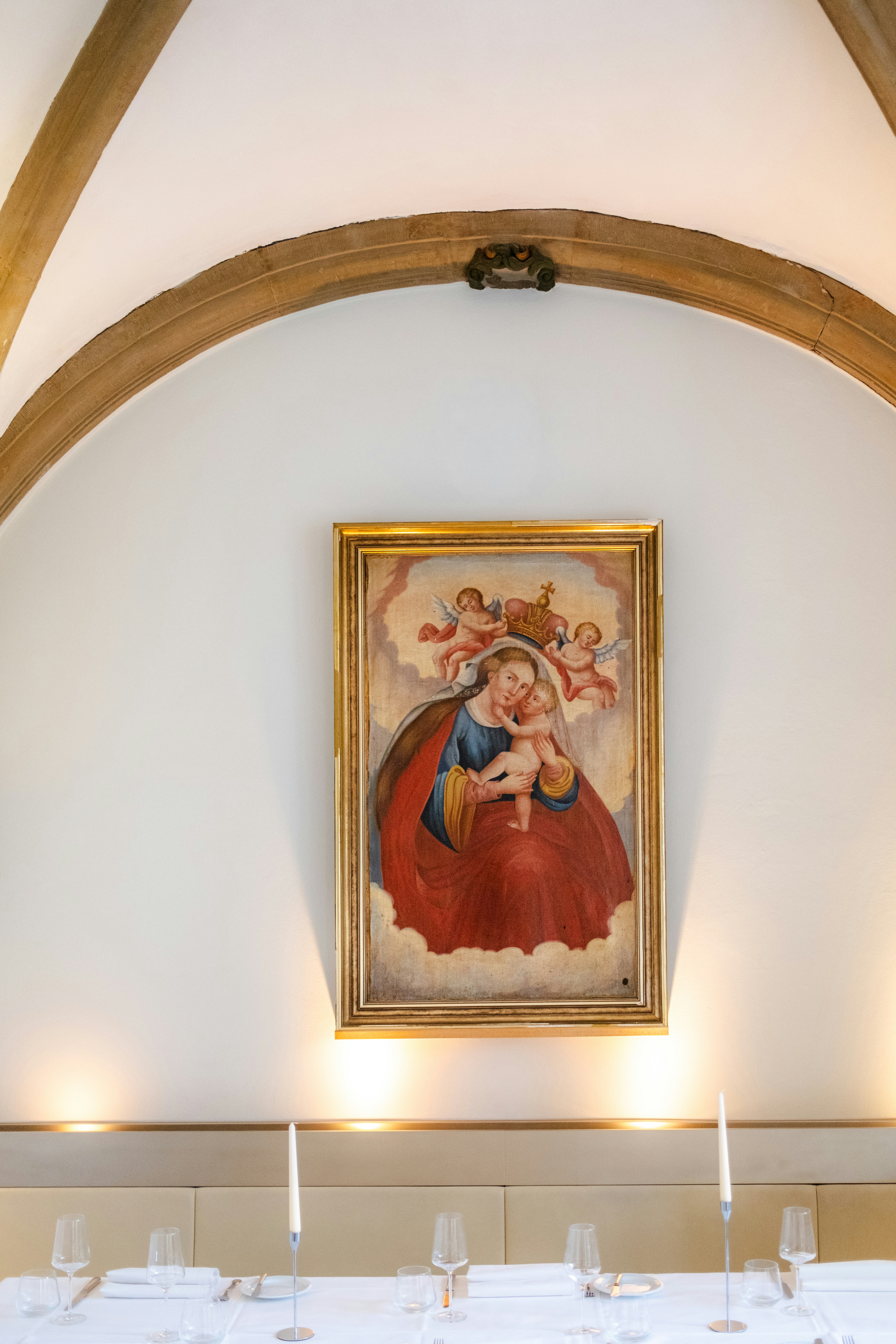 Painting of madonna and child with angels